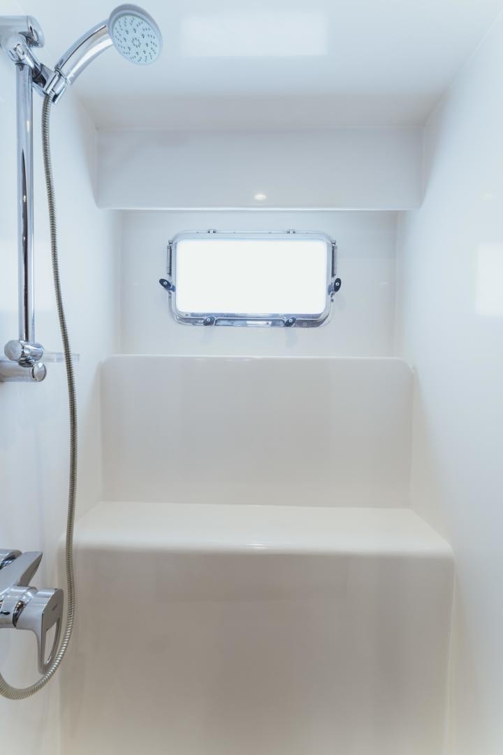 a shower unit with a glass door aboard SKULLDUGGERY Yacht for Sale