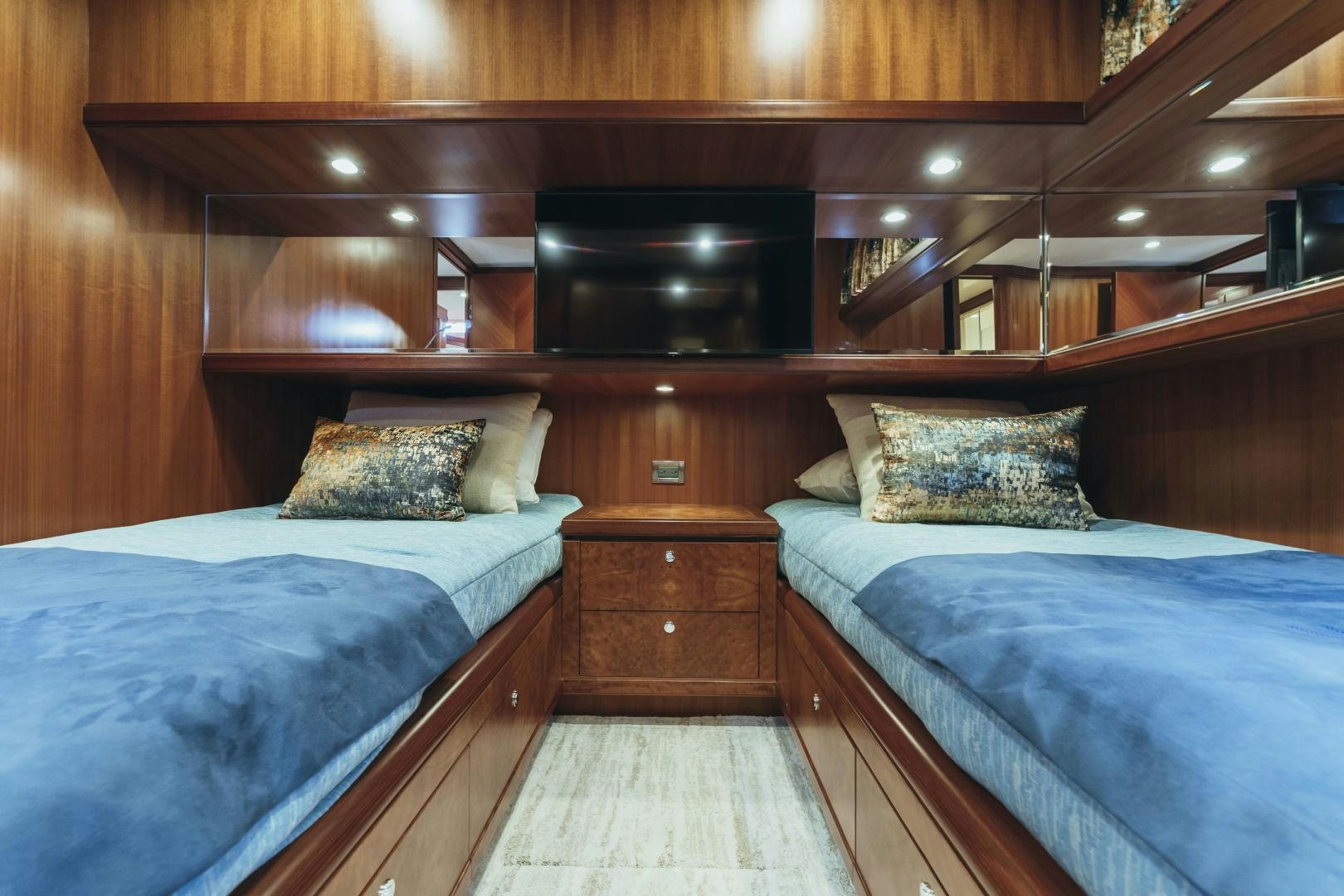 a couple of beds in a room aboard SKULLDUGGERY Yacht for Sale
