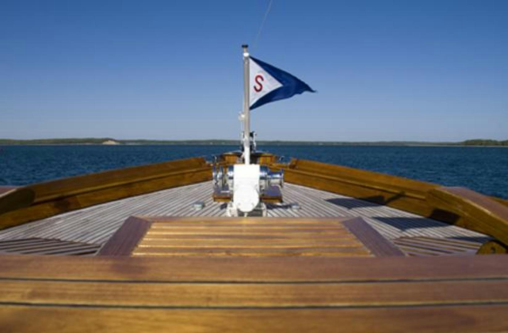 a flag on a rocket aboard AMERICA Yacht for Sale