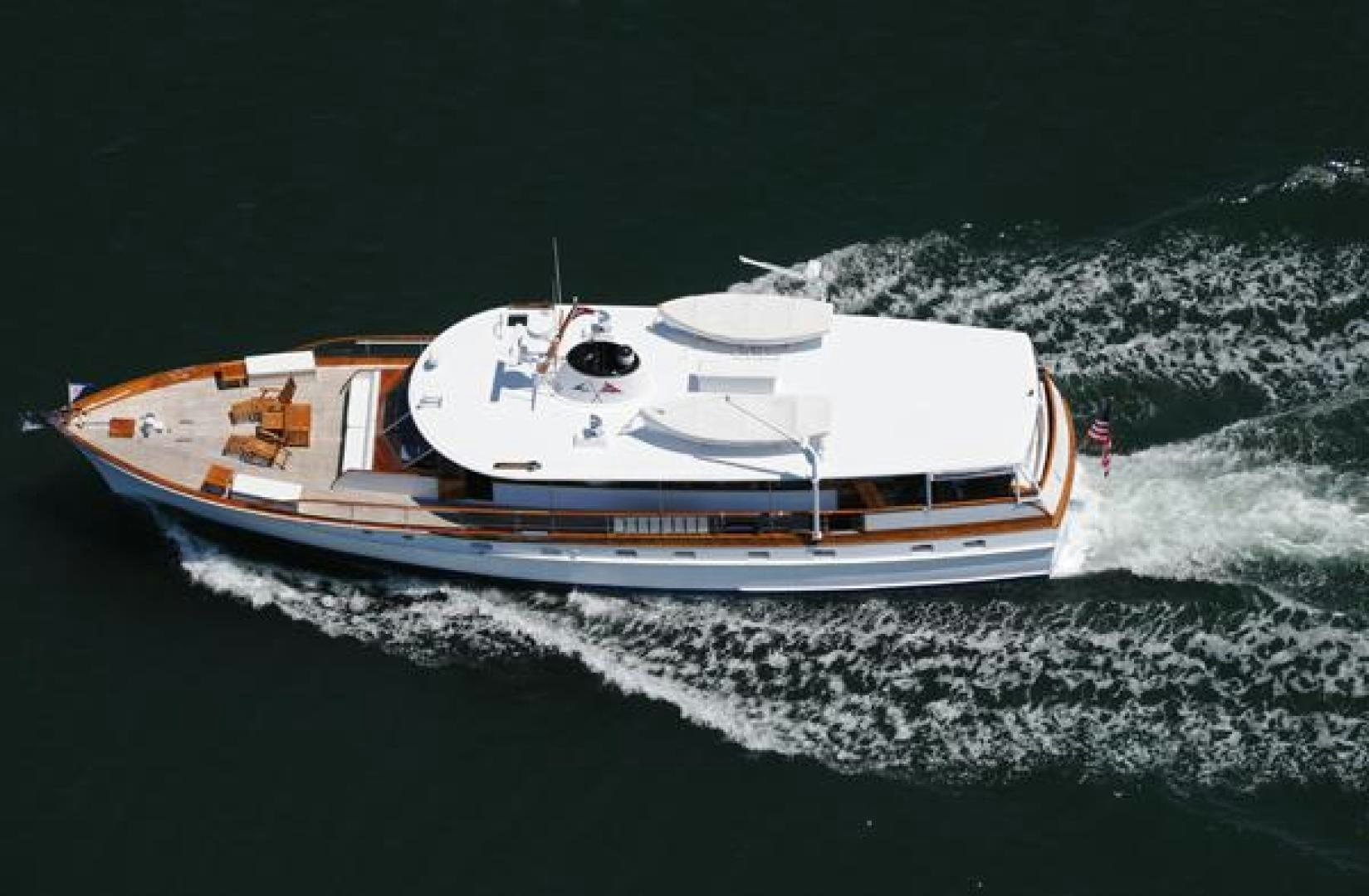 a boat on the water aboard AMERICA Yacht for Sale
