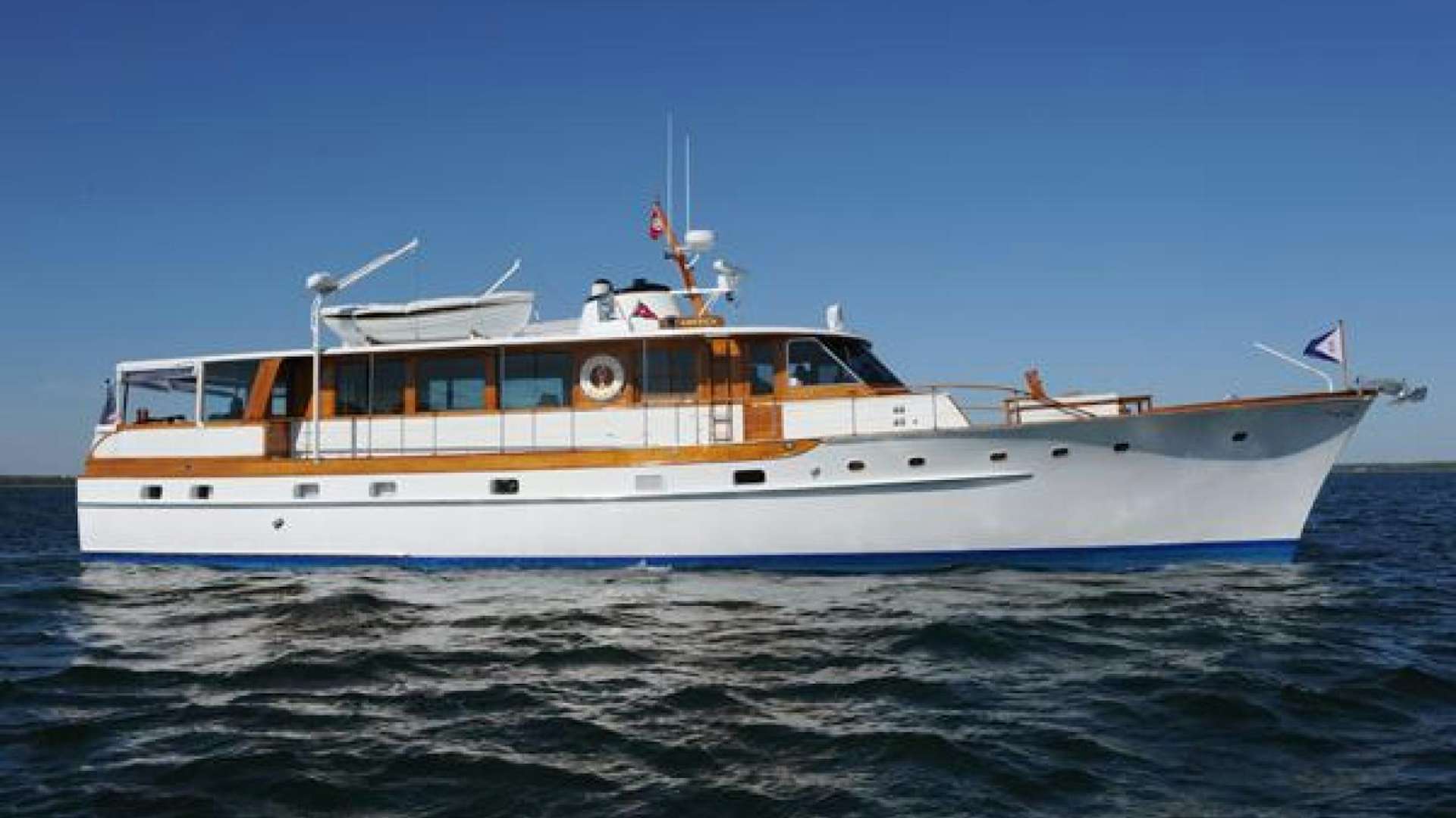 a boat in the water aboard AMERICA Yacht for Sale