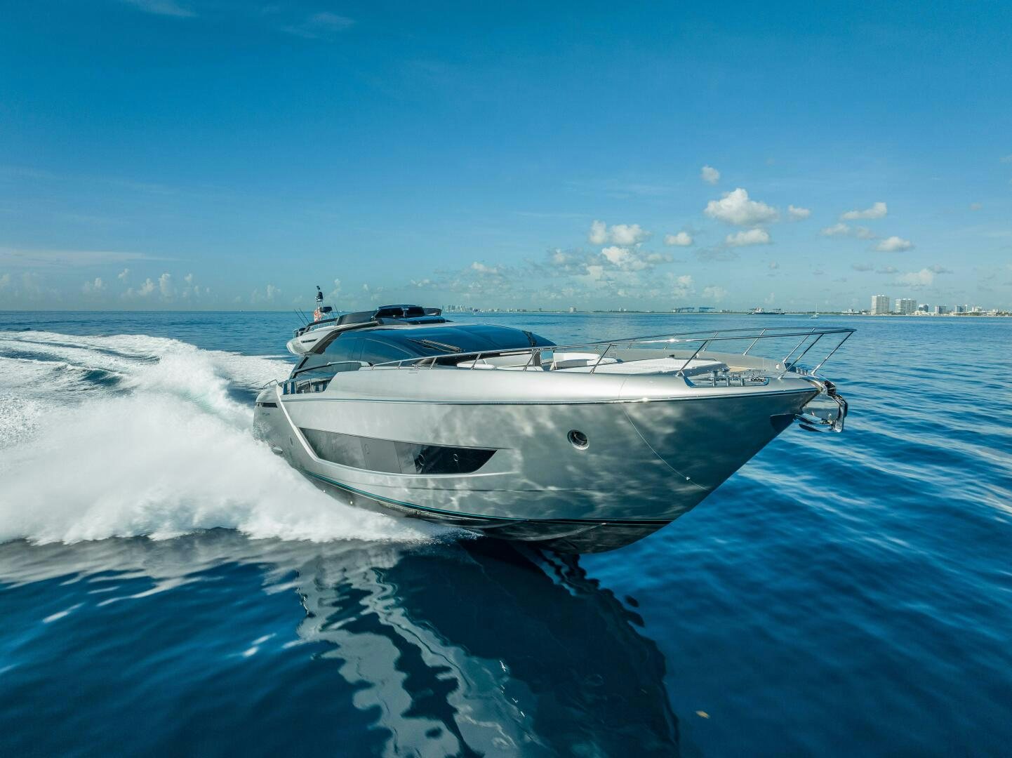 a white boat in the water aboard LISOLO Yacht for Sale