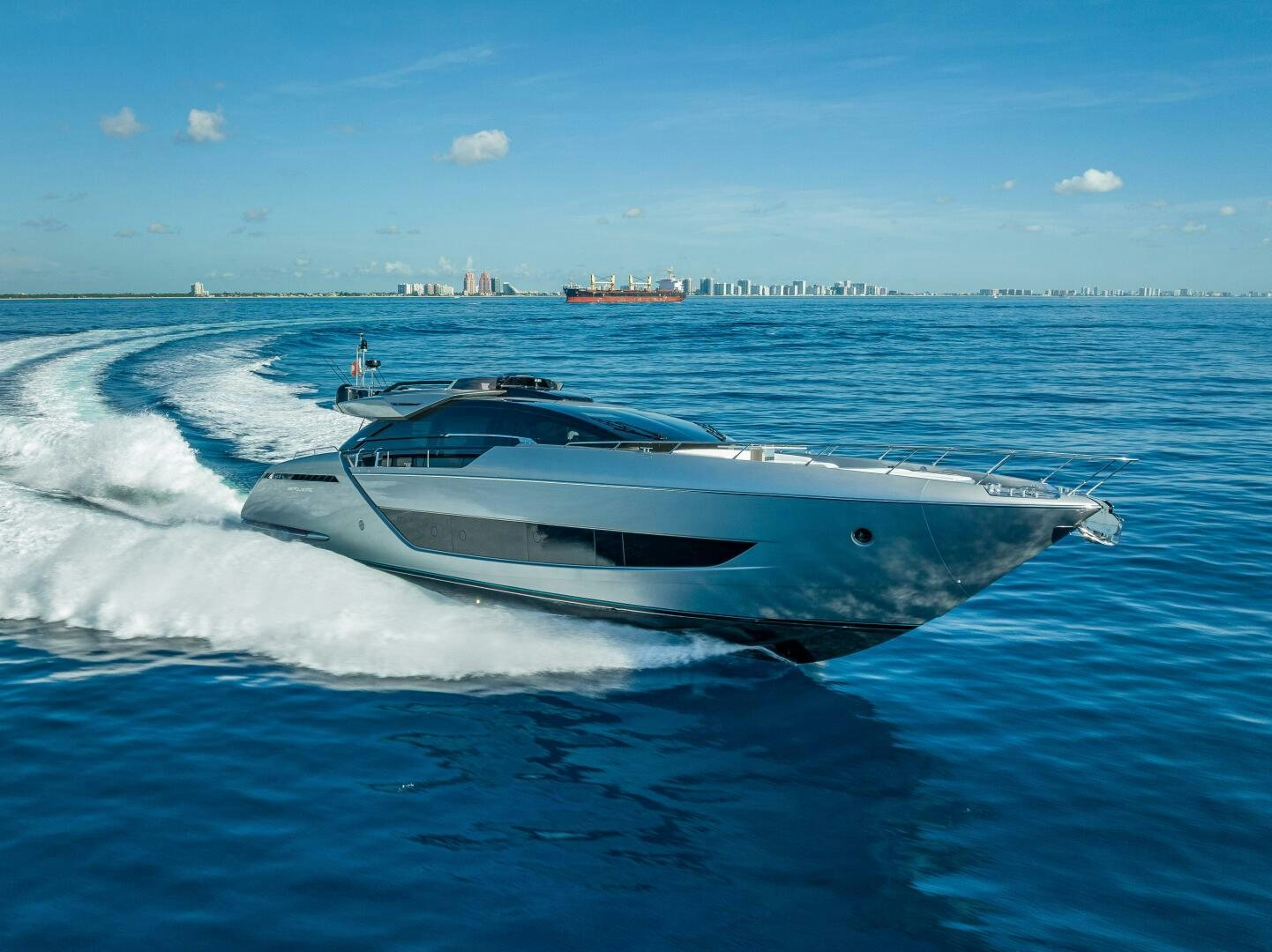 a white yacht on the water aboard LISOLO Yacht for Sale