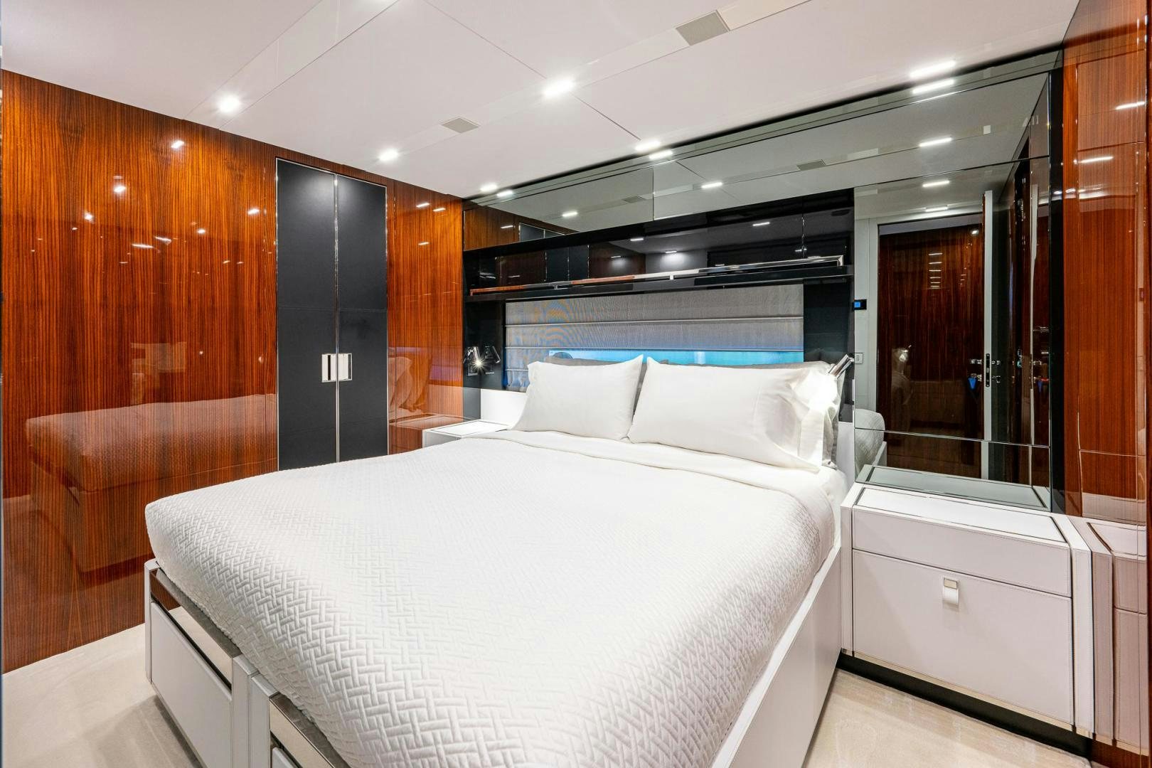 a bed in a room aboard LISOLO Yacht for Sale
