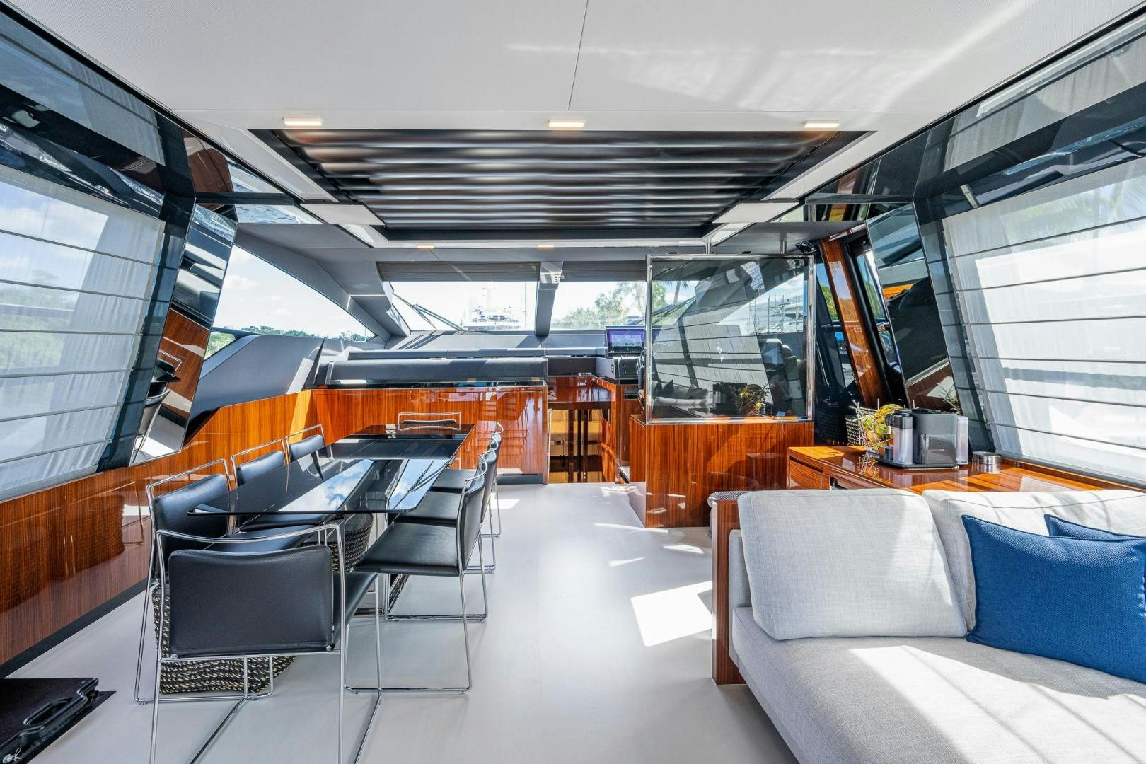 inside of a building with a large glass wall and a large window aboard LISOLO Yacht for Sale