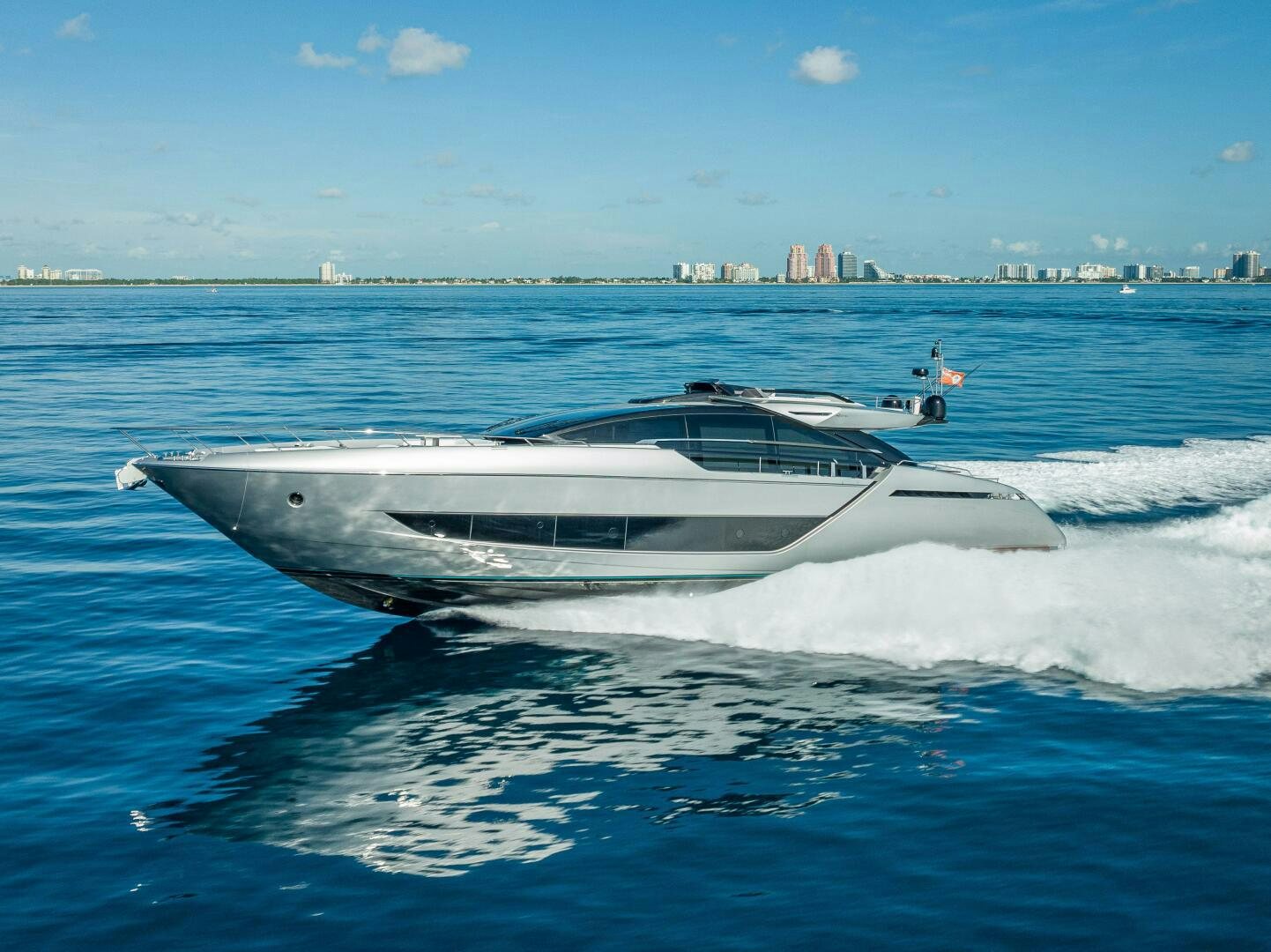 a white yacht on the water aboard LISOLO Yacht for Sale