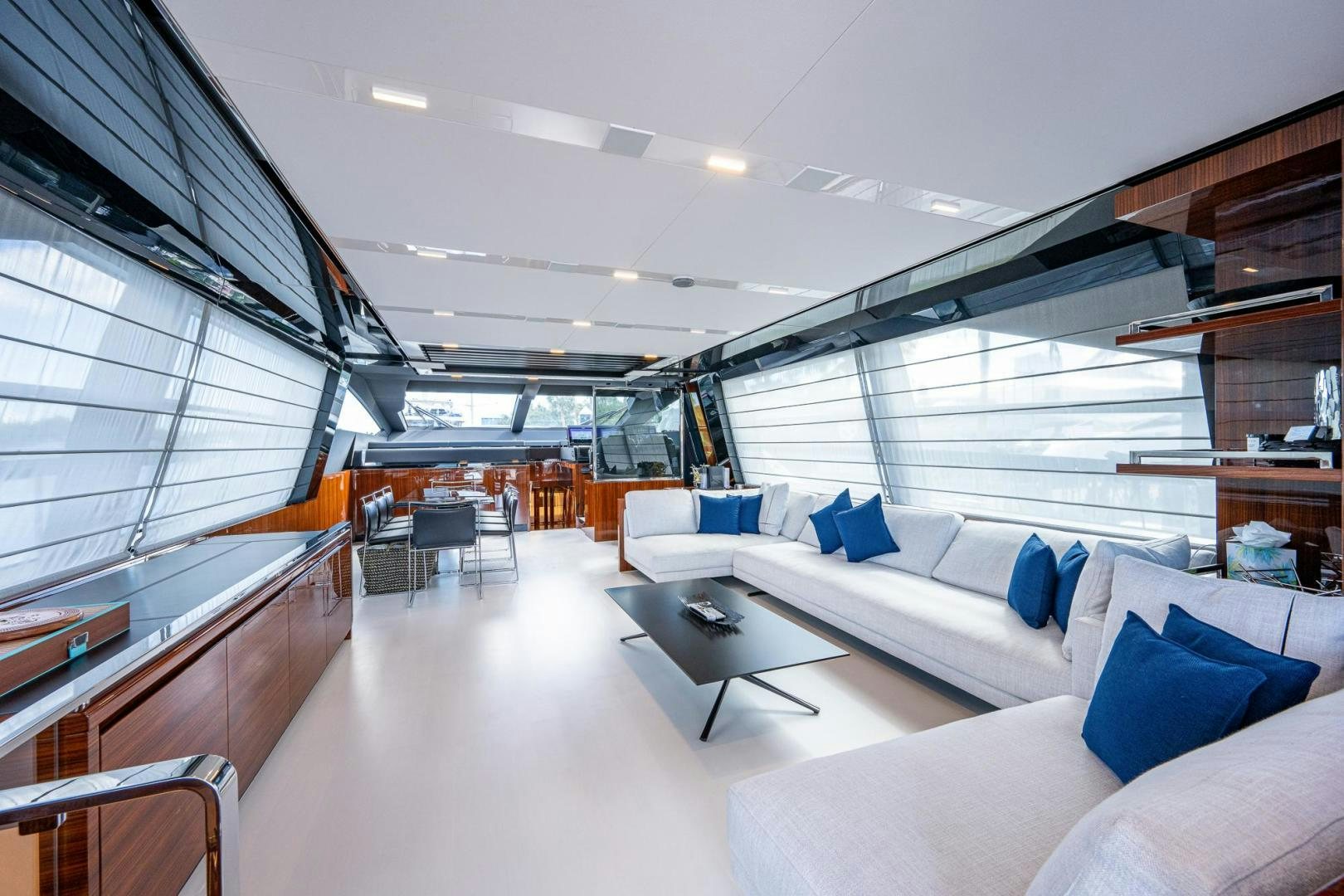 a room with couches and a table aboard LISOLO Yacht for Sale