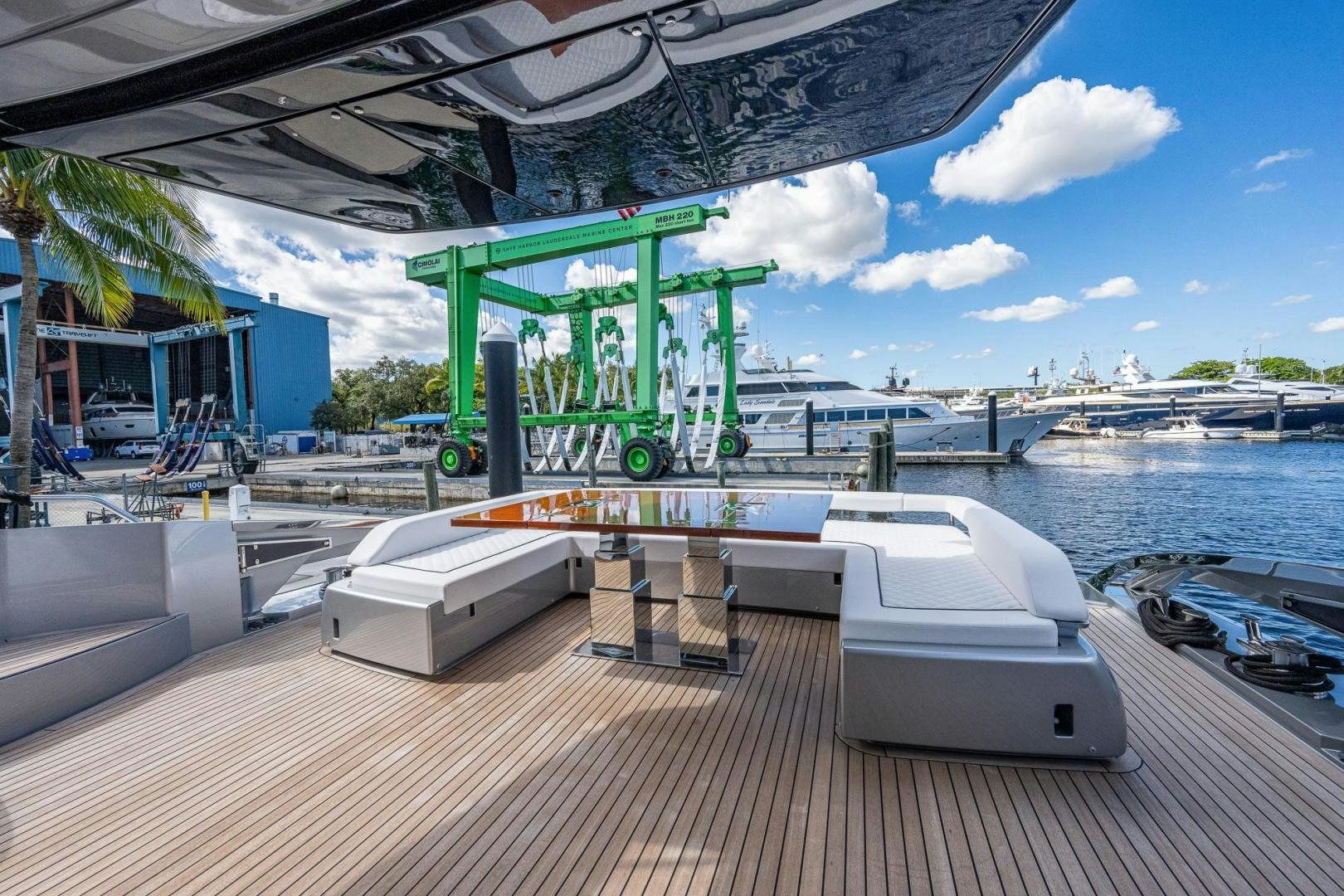 a large green machine on a dock aboard LISOLO Yacht for Sale