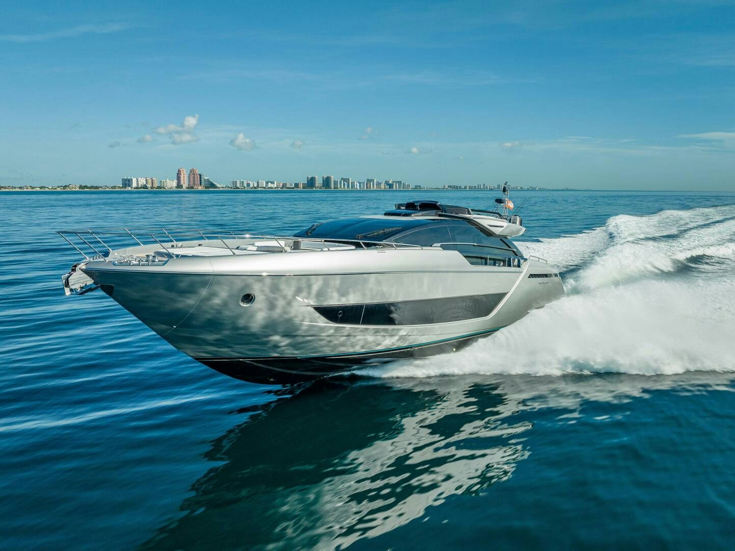 a white boat on the water aboard LISOLO Yacht for Sale