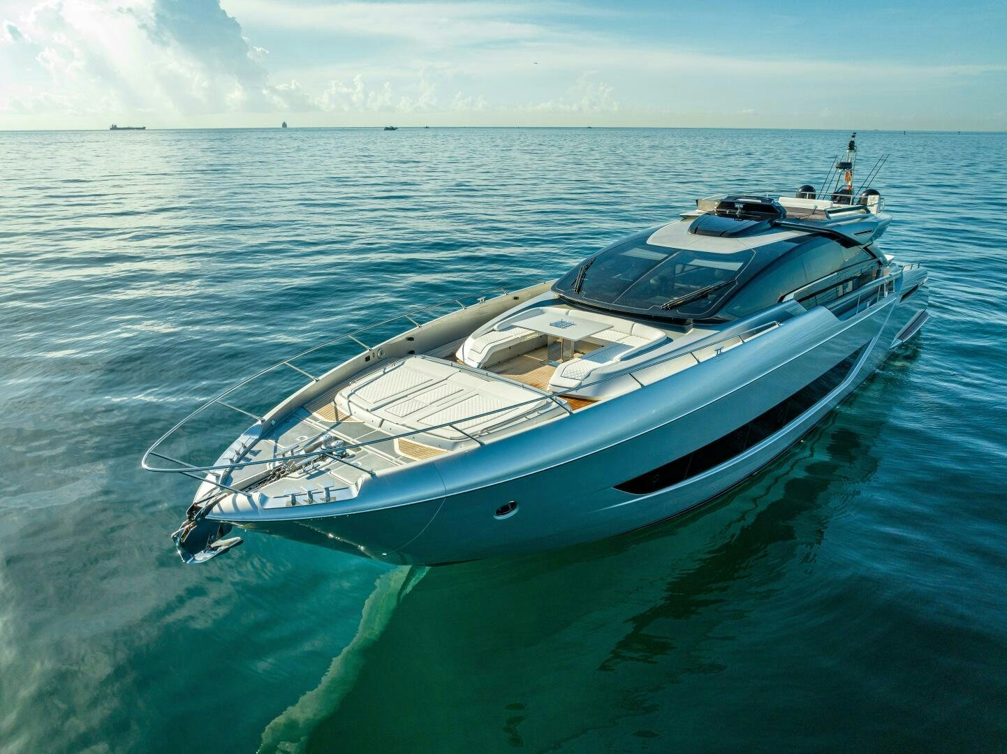 a white yacht in the ocean aboard LISOLO Yacht for Sale