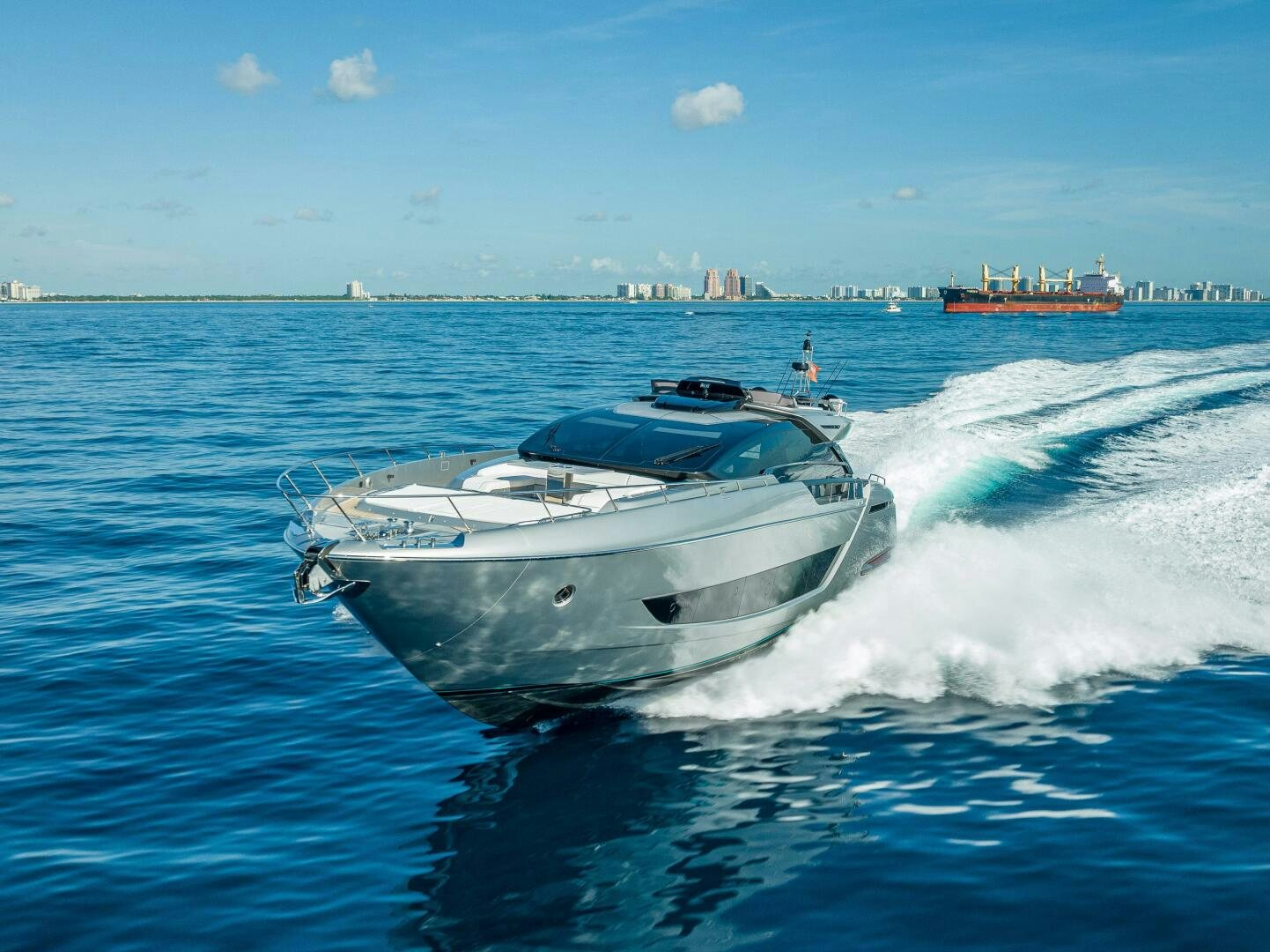 a white yacht on the water aboard LISOLO Yacht for Sale