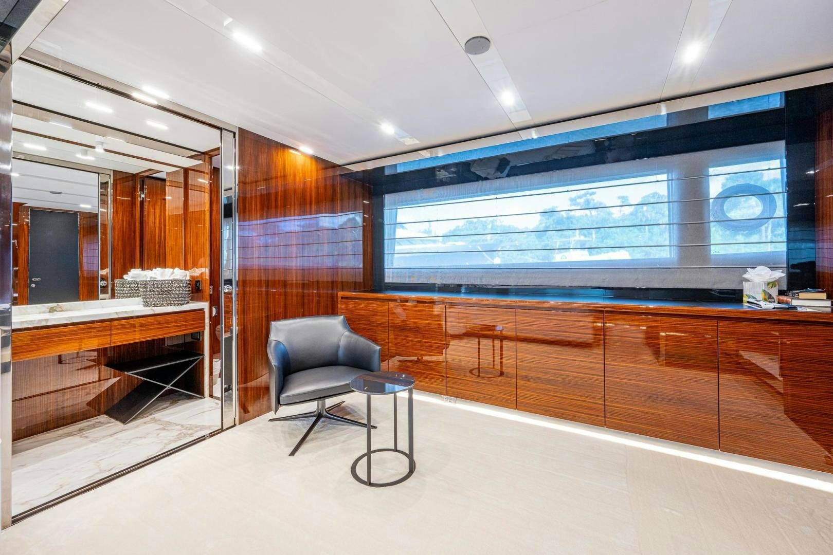a room with a chair and a desk aboard LISOLO Yacht for Sale