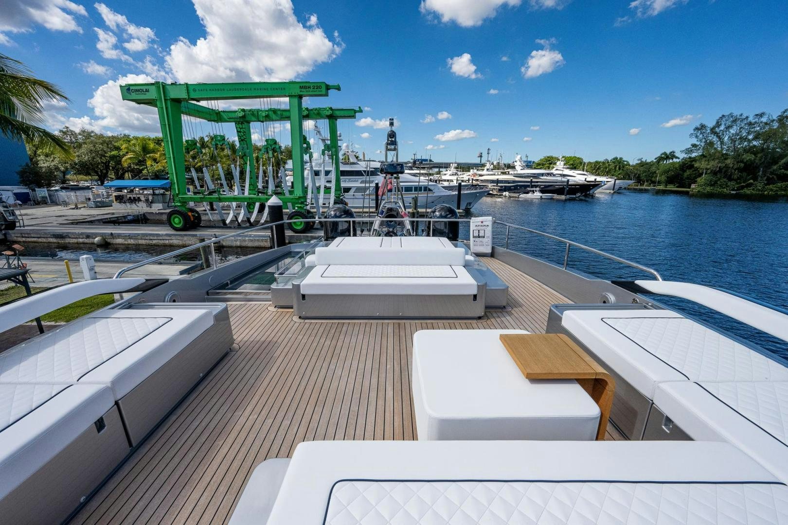 a large green machine on a dock aboard LISOLO Yacht for Sale