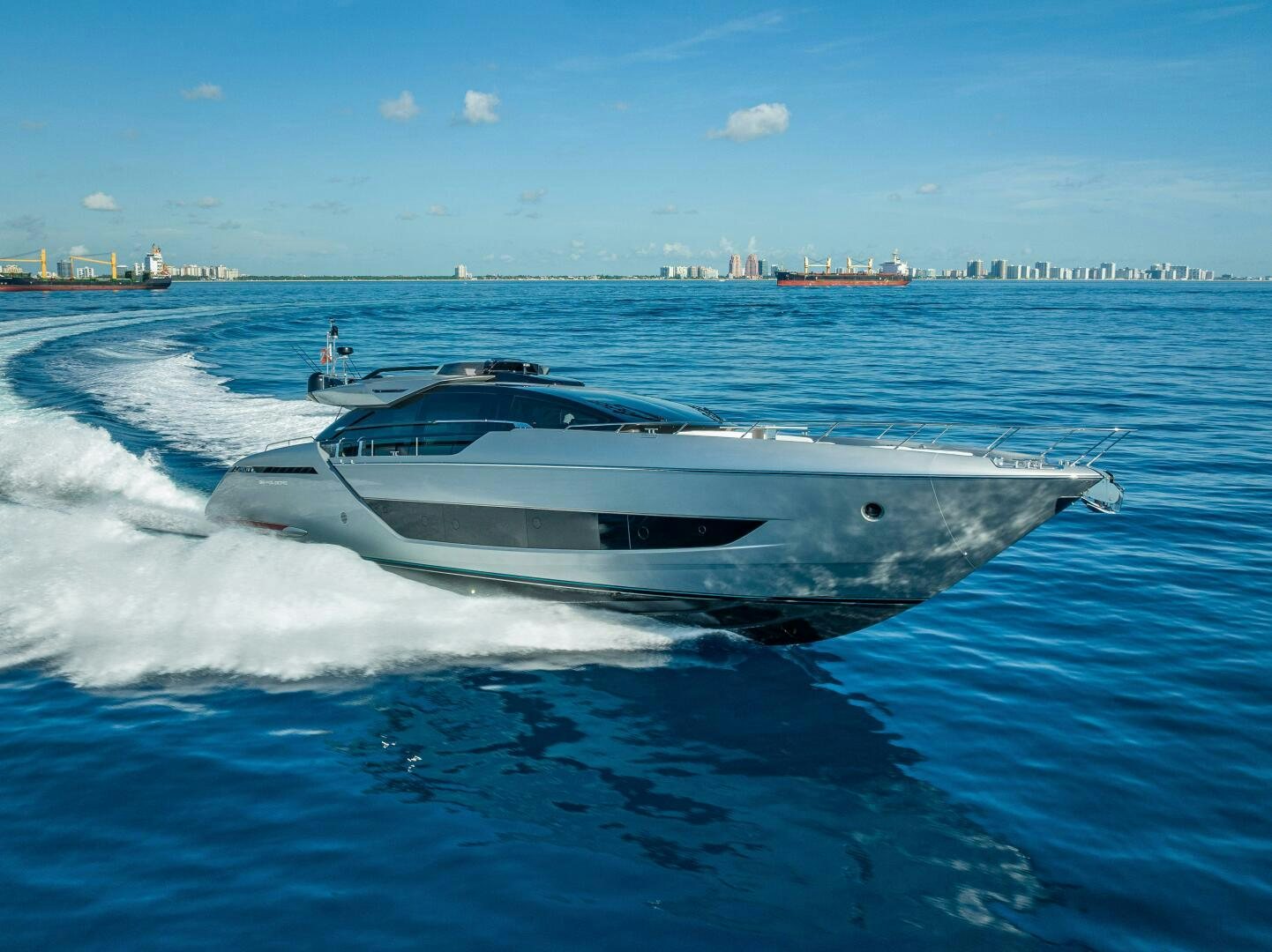 a white yacht on the water aboard LISOLO Yacht for Sale