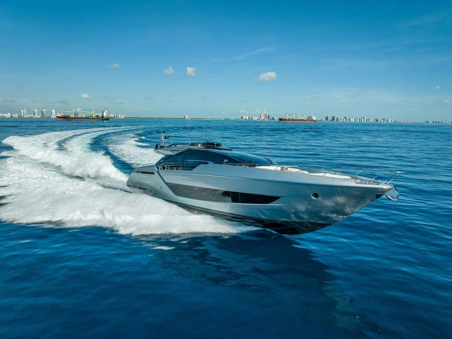 a white yacht on the water aboard LISOLO Yacht for Sale