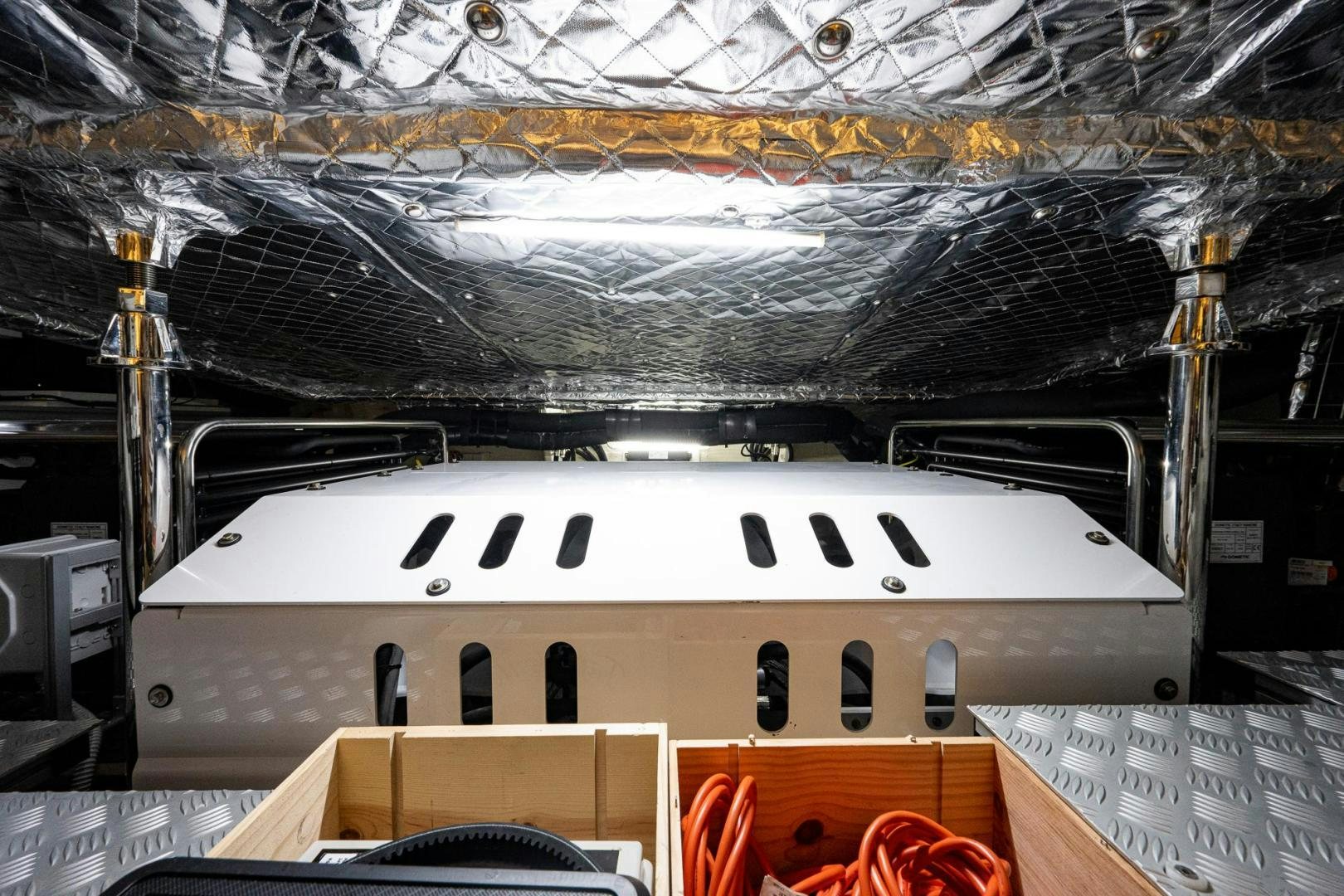 a large white boat in a large building aboard LISOLO Yacht for Sale