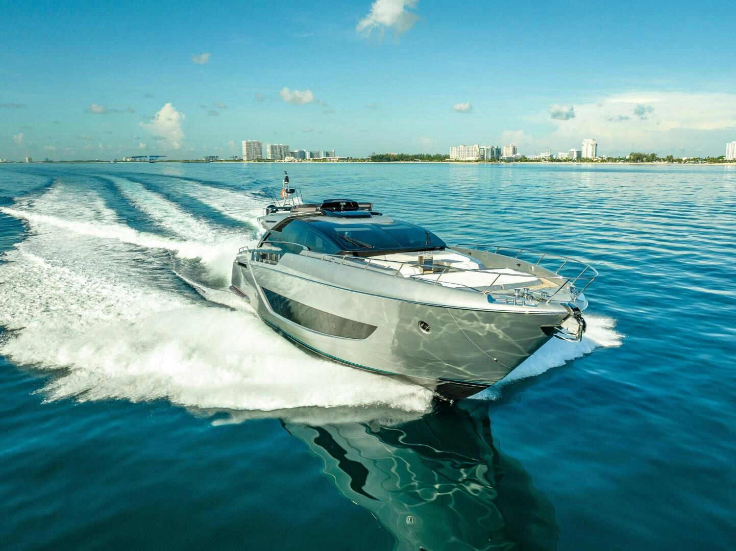 a white yacht on the water aboard LISOLO Yacht for Sale