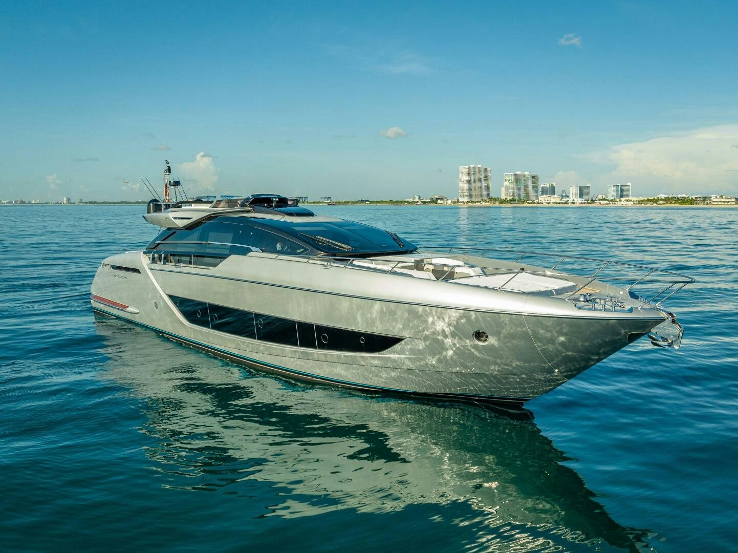 a white yacht on the water aboard LISOLO Yacht for Sale