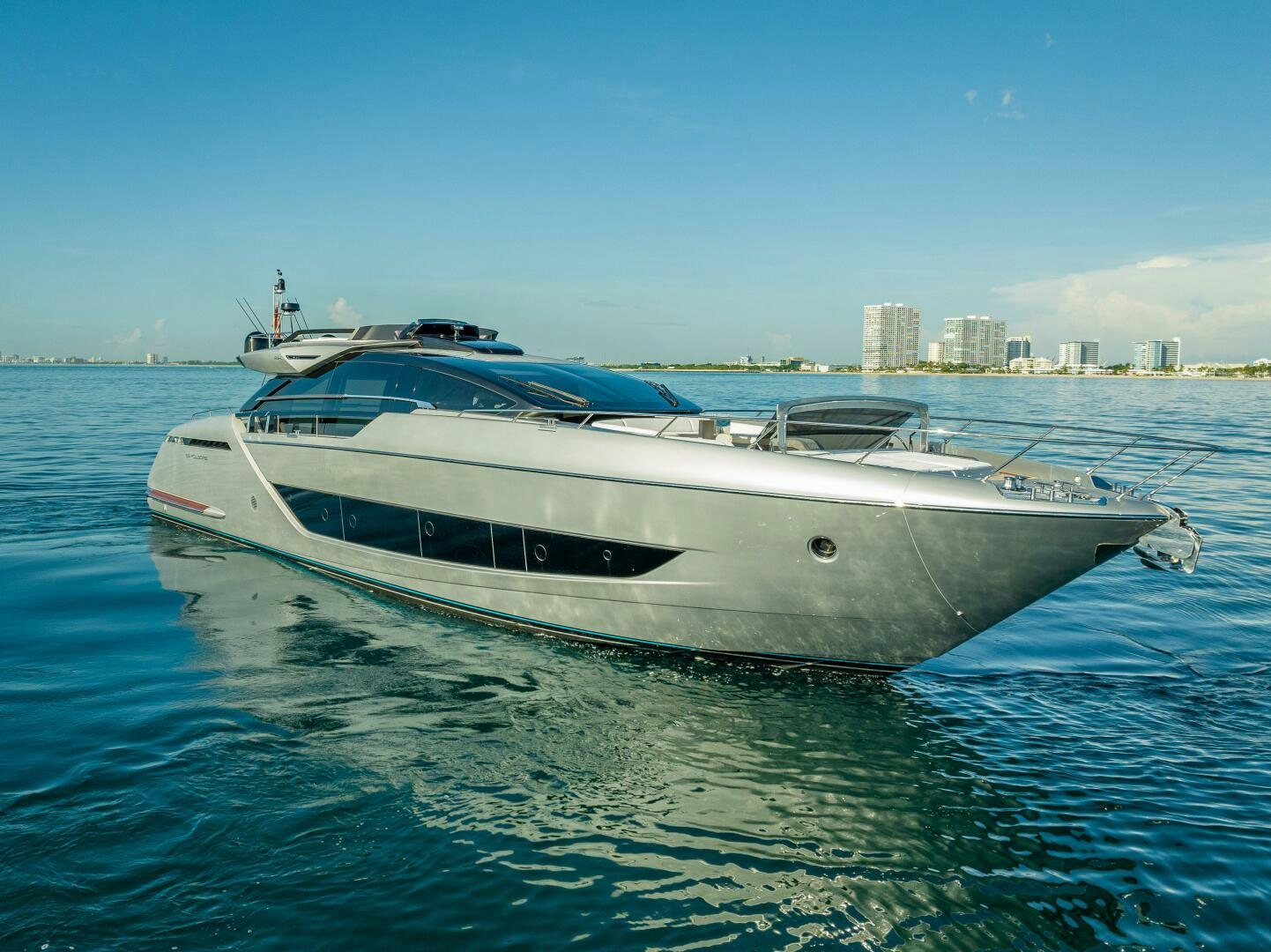 a white yacht in the water aboard LISOLO Yacht for Sale