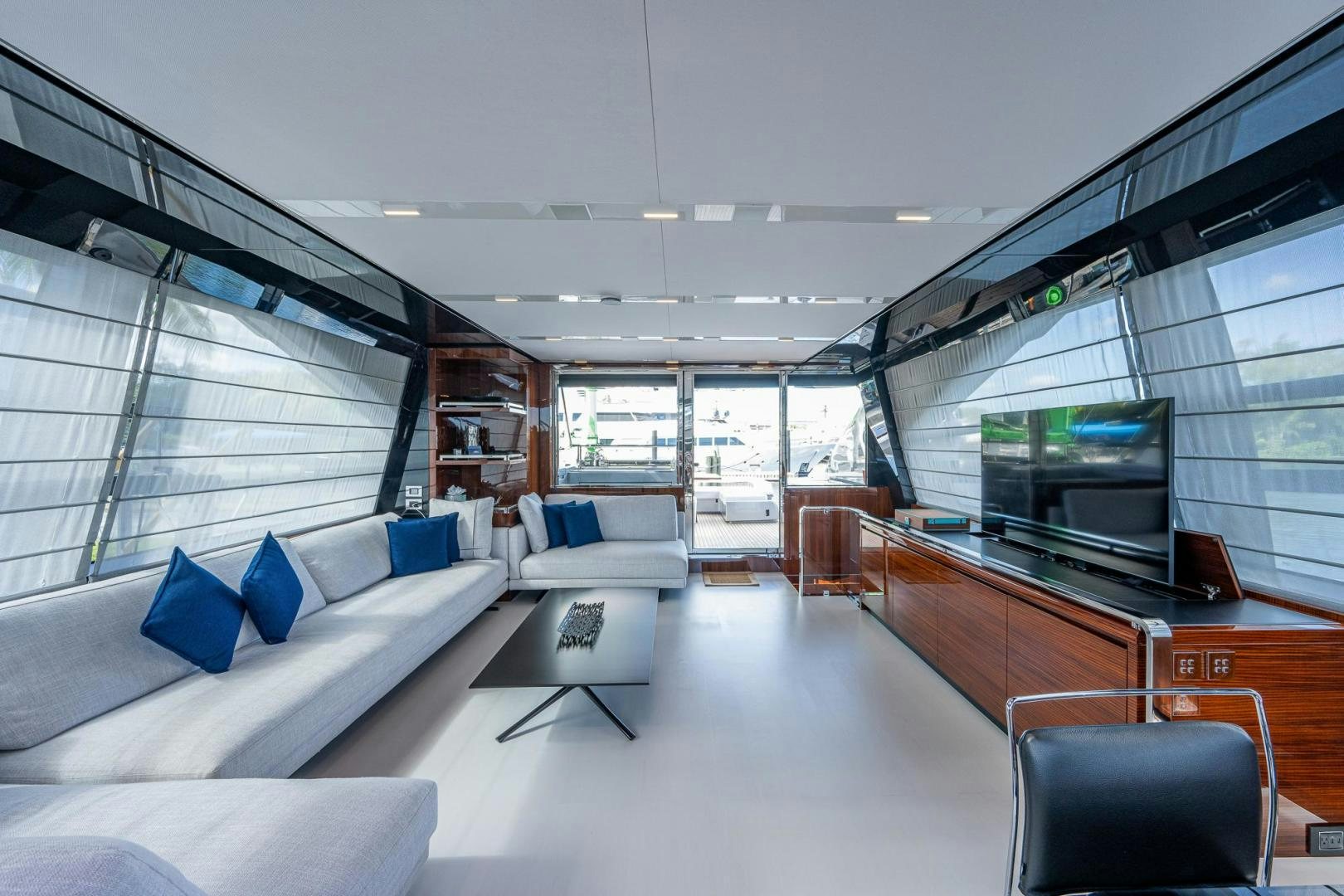a room with a couch and a tv aboard LISOLO Yacht for Sale