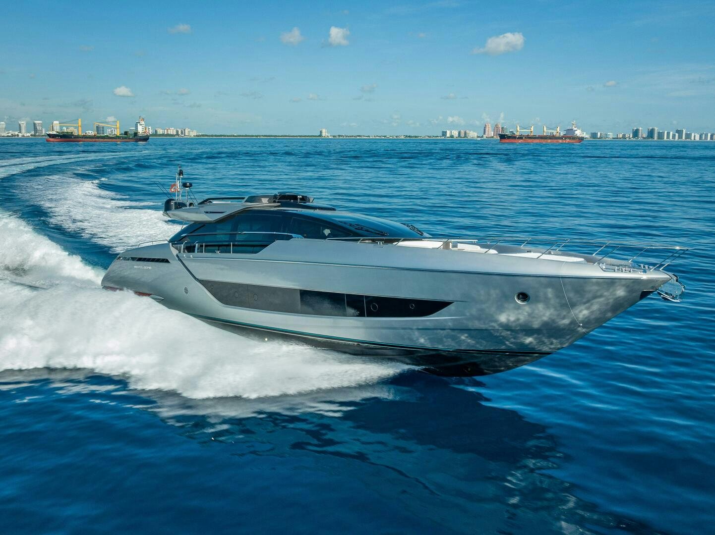 a white yacht on the water aboard LISOLO Yacht for Sale