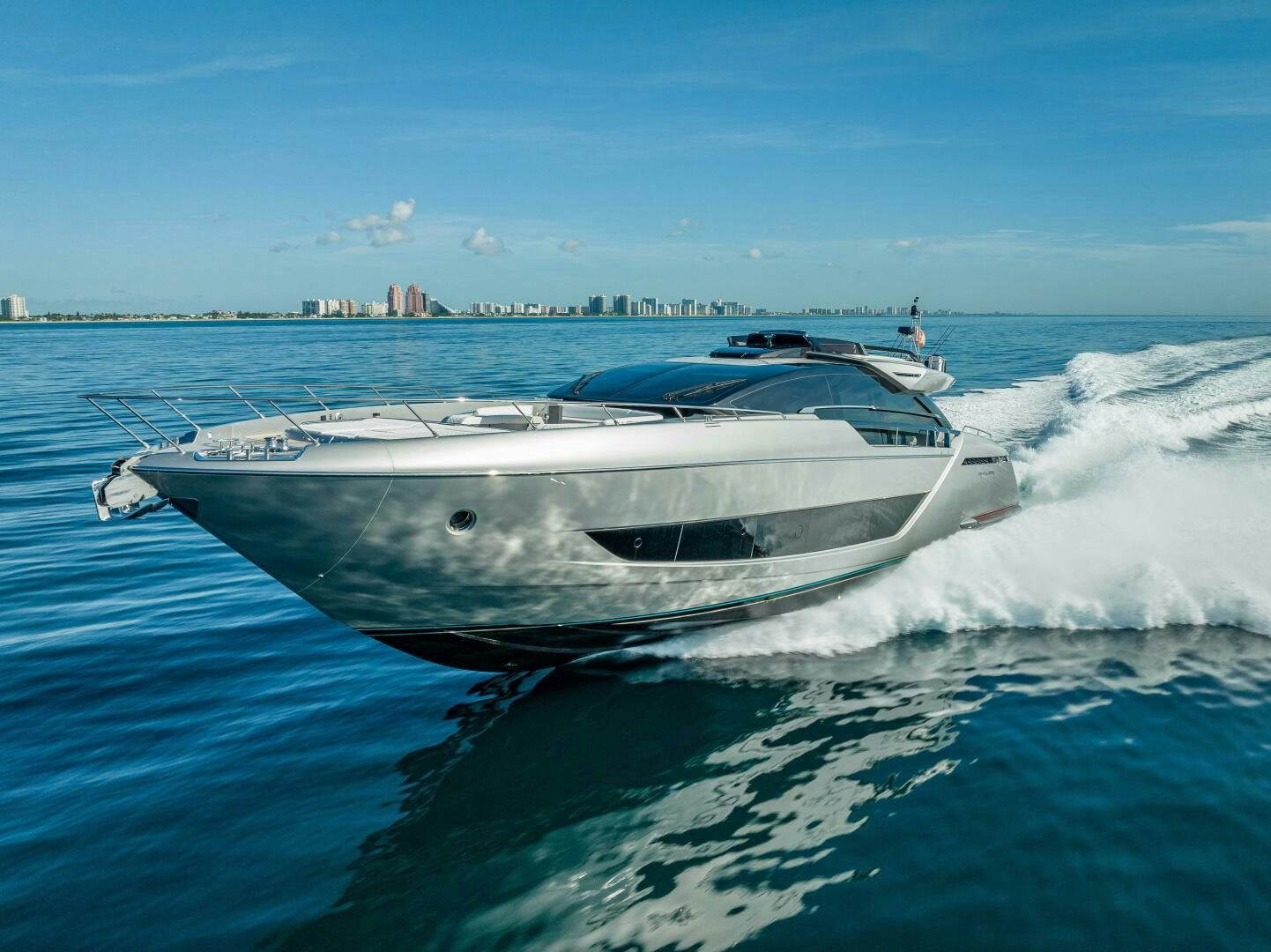 a white yacht on the water aboard LISOLO Yacht for Sale