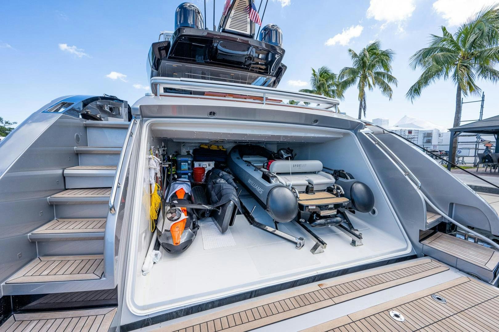 a car on the back of a truck aboard LISOLO Yacht for Sale