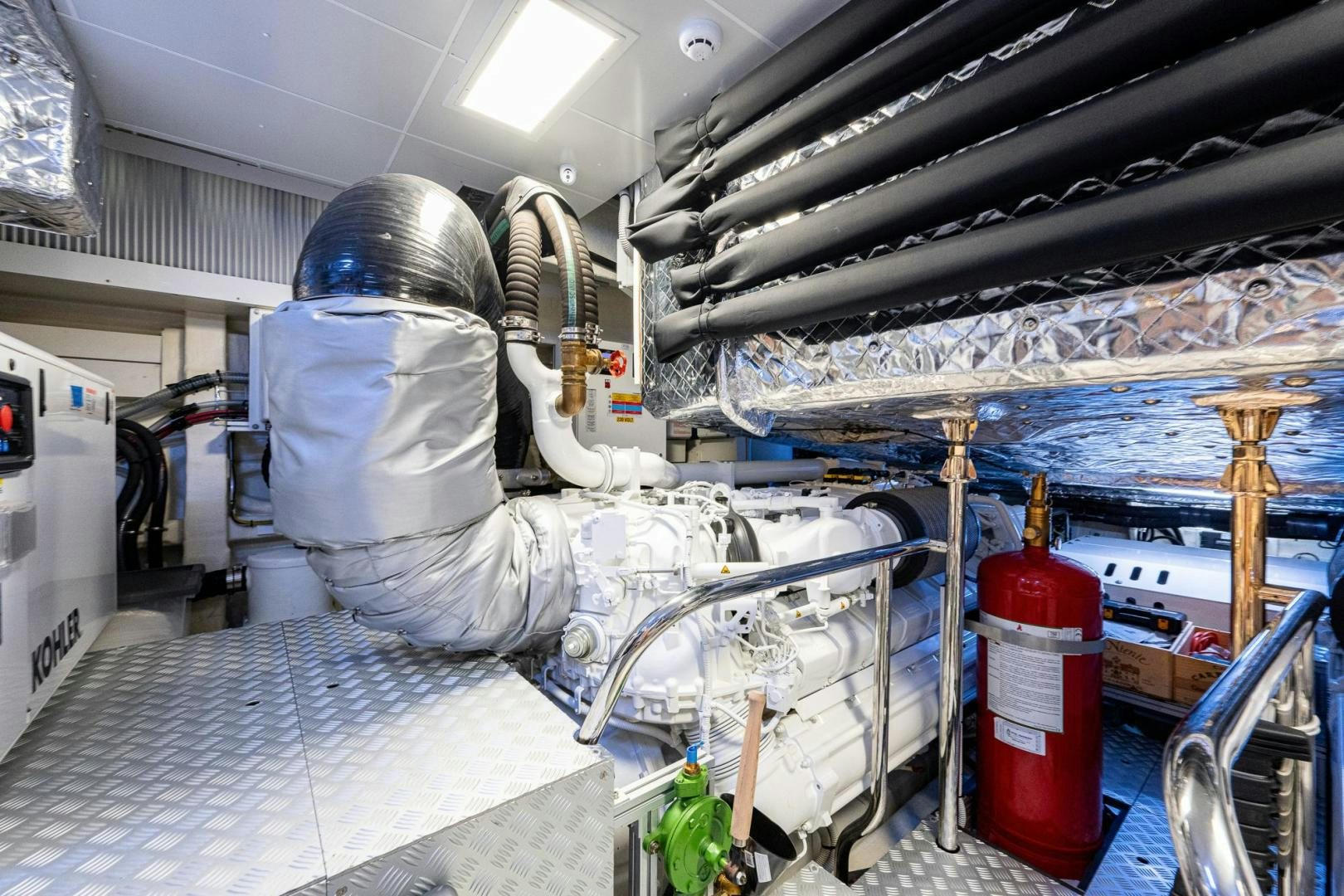 a person in a white coat in a factory aboard LISOLO Yacht for Sale