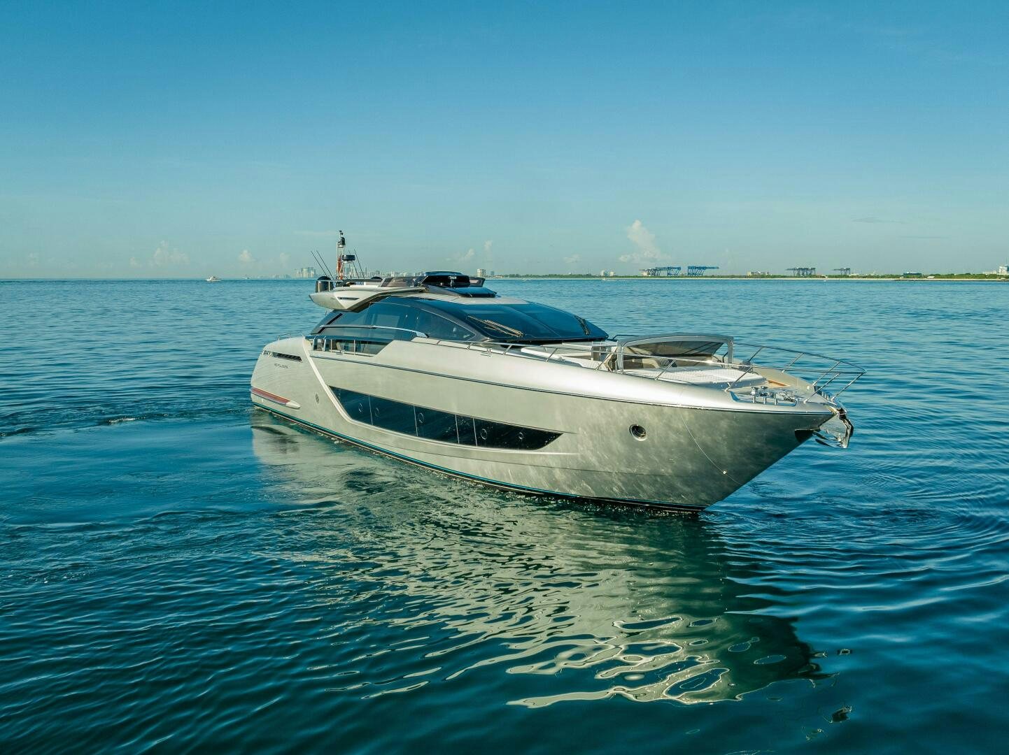 a white yacht on the water aboard LISOLO Yacht for Sale