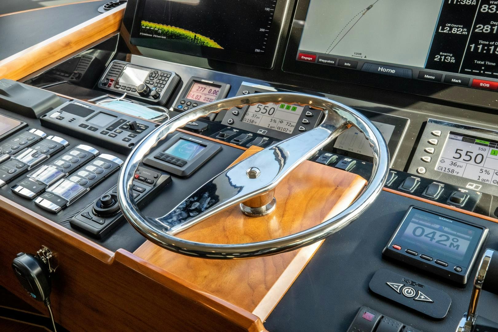 a close-up of a radio aboard POMPINA Yacht for Sale