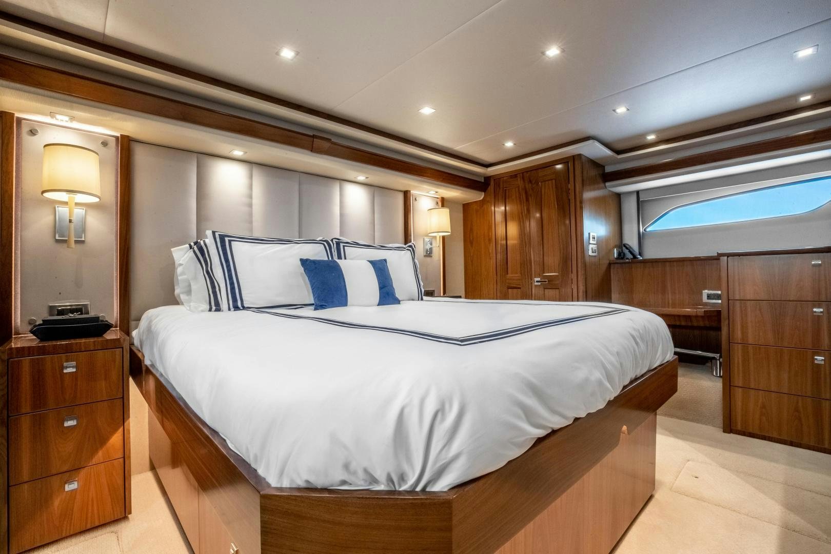 a bed in a room aboard POMPINA Yacht for Sale