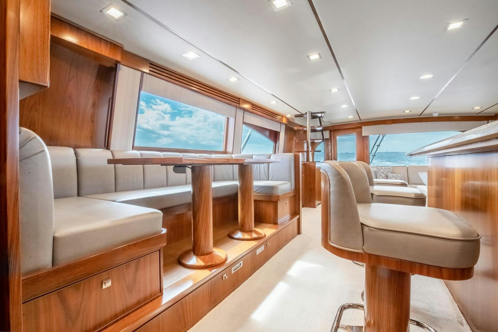 a room with a couch and a table aboard POMPINA Yacht for Sale