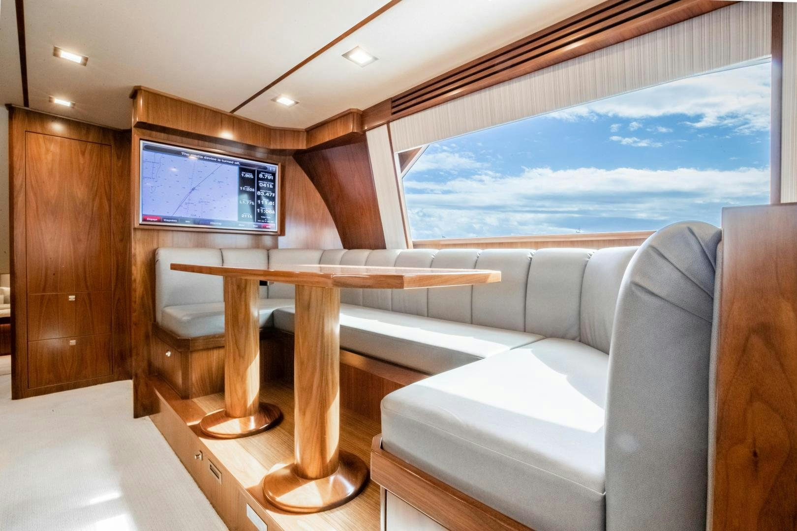 a room with a couch and a table aboard POMPINA Yacht for Sale