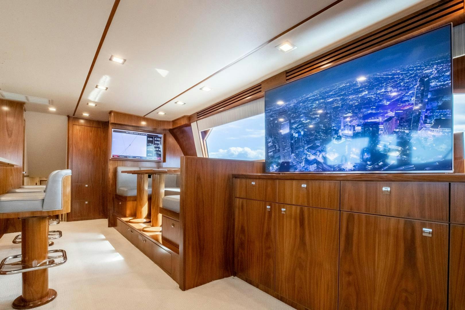 a room with a large screen aboard POMPINA Yacht for Sale