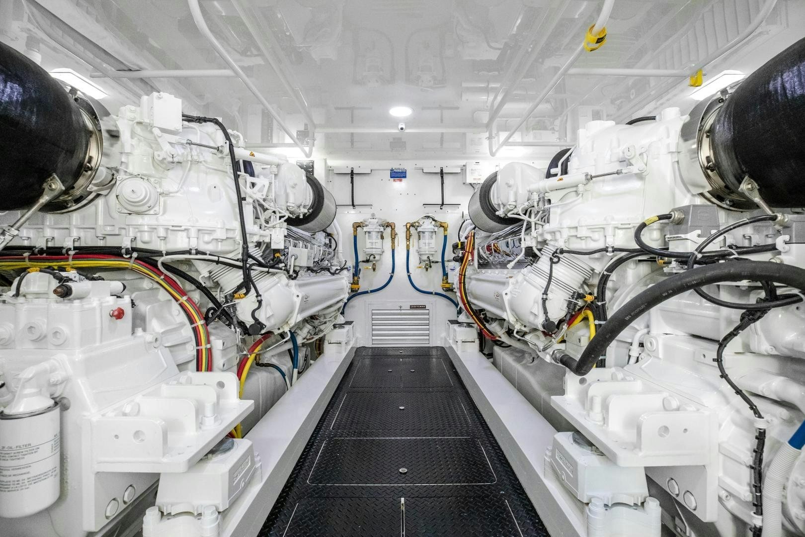 a large white machine in a room aboard POMPINA Yacht for Sale