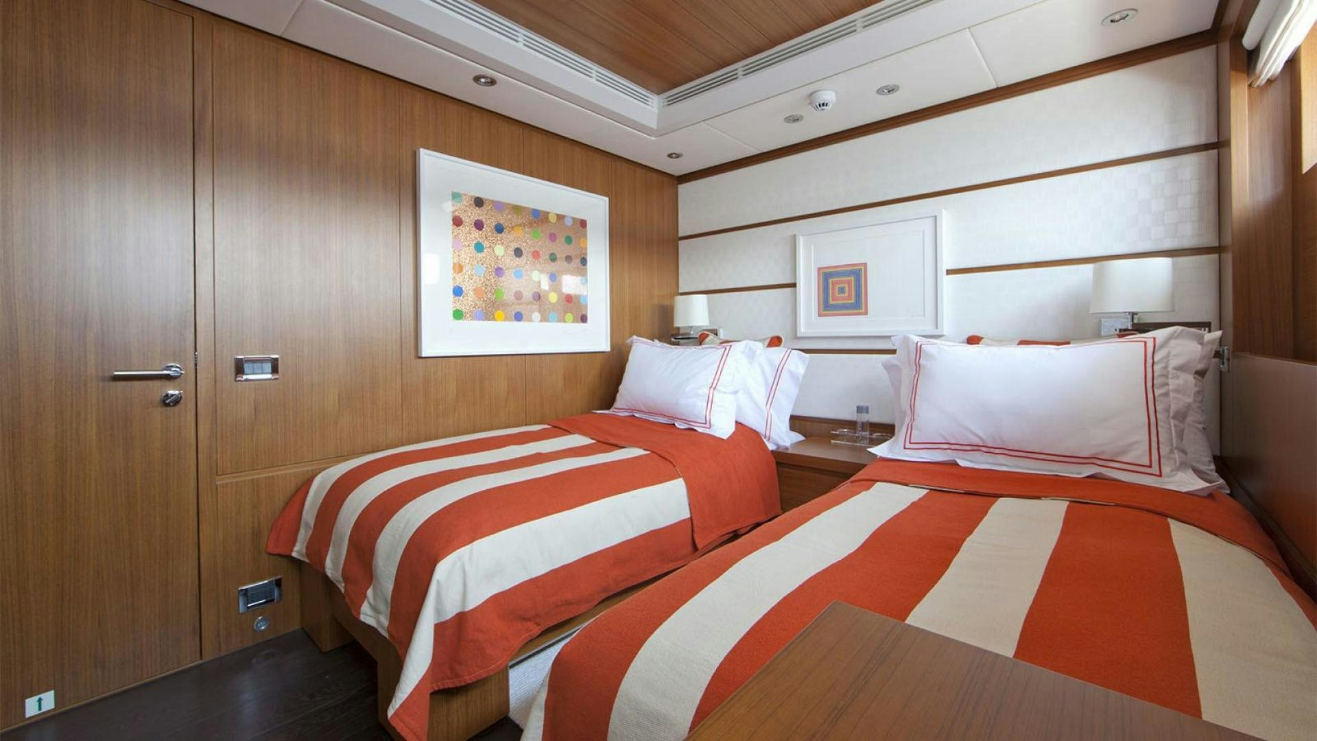 a room with two beds aboard SNOWBIRD Yacht for Sale