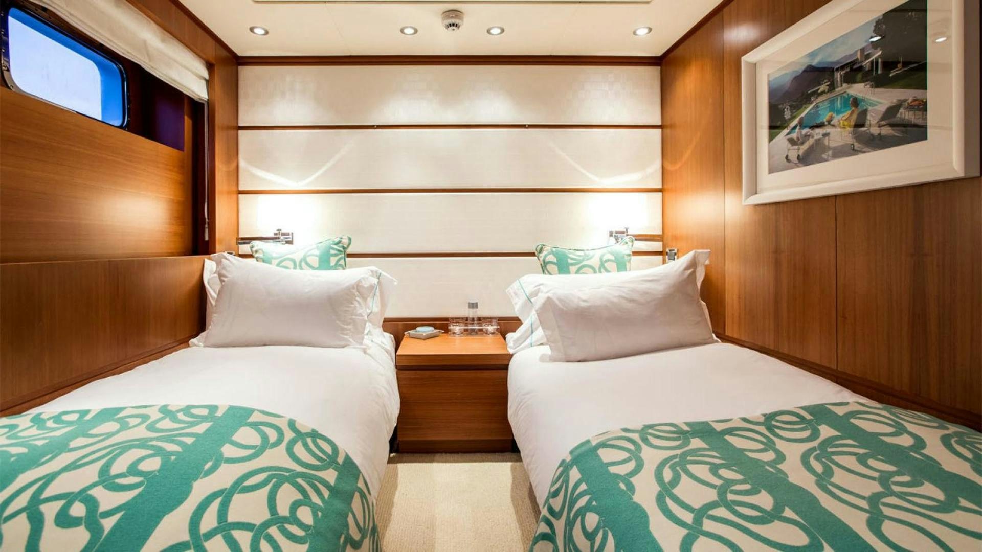 a room with two beds aboard SNOWBIRD Yacht for Sale