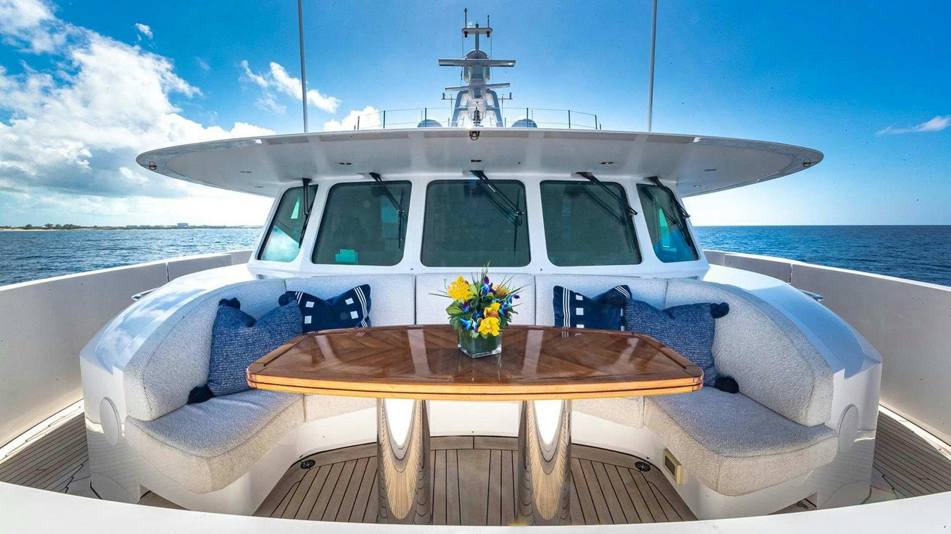 a white car on a boat aboard SNOWBIRD Yacht for Sale