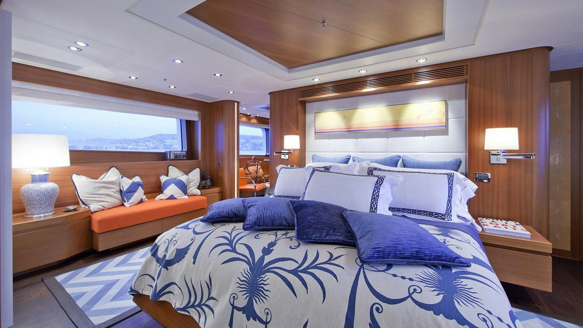 a large bed in a room aboard SNOWBIRD Yacht for Sale