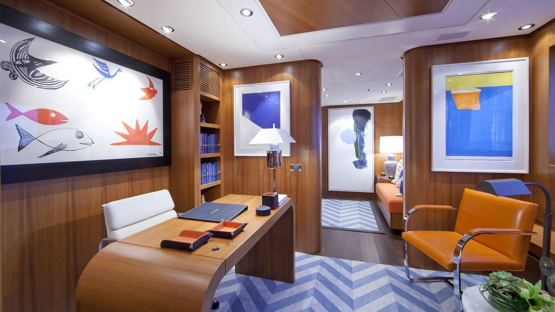 a room with a desk and a tv aboard SNOWBIRD Yacht for Sale