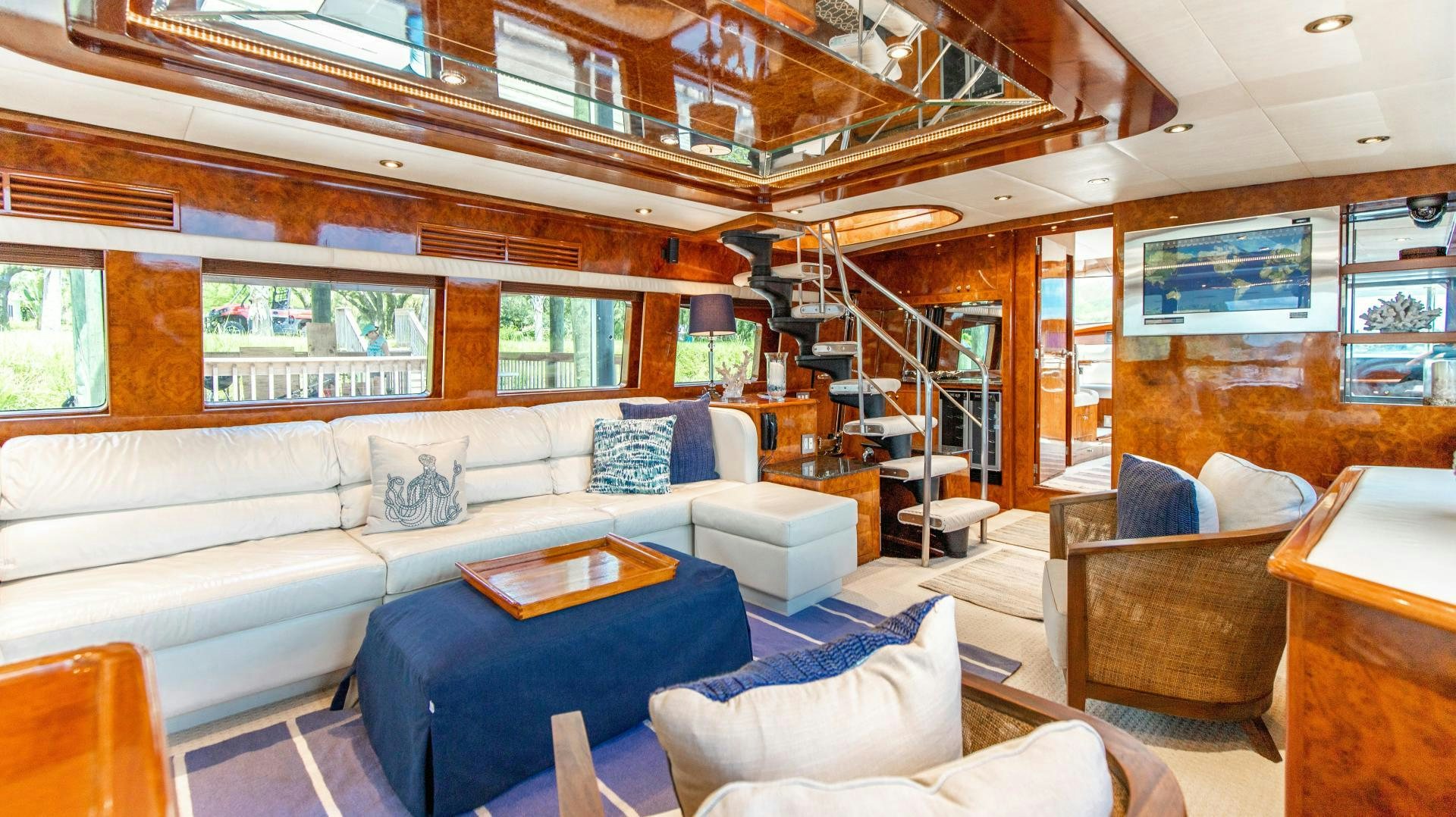a living room with a large loft aboard DREAMCHASER Yacht for Sale