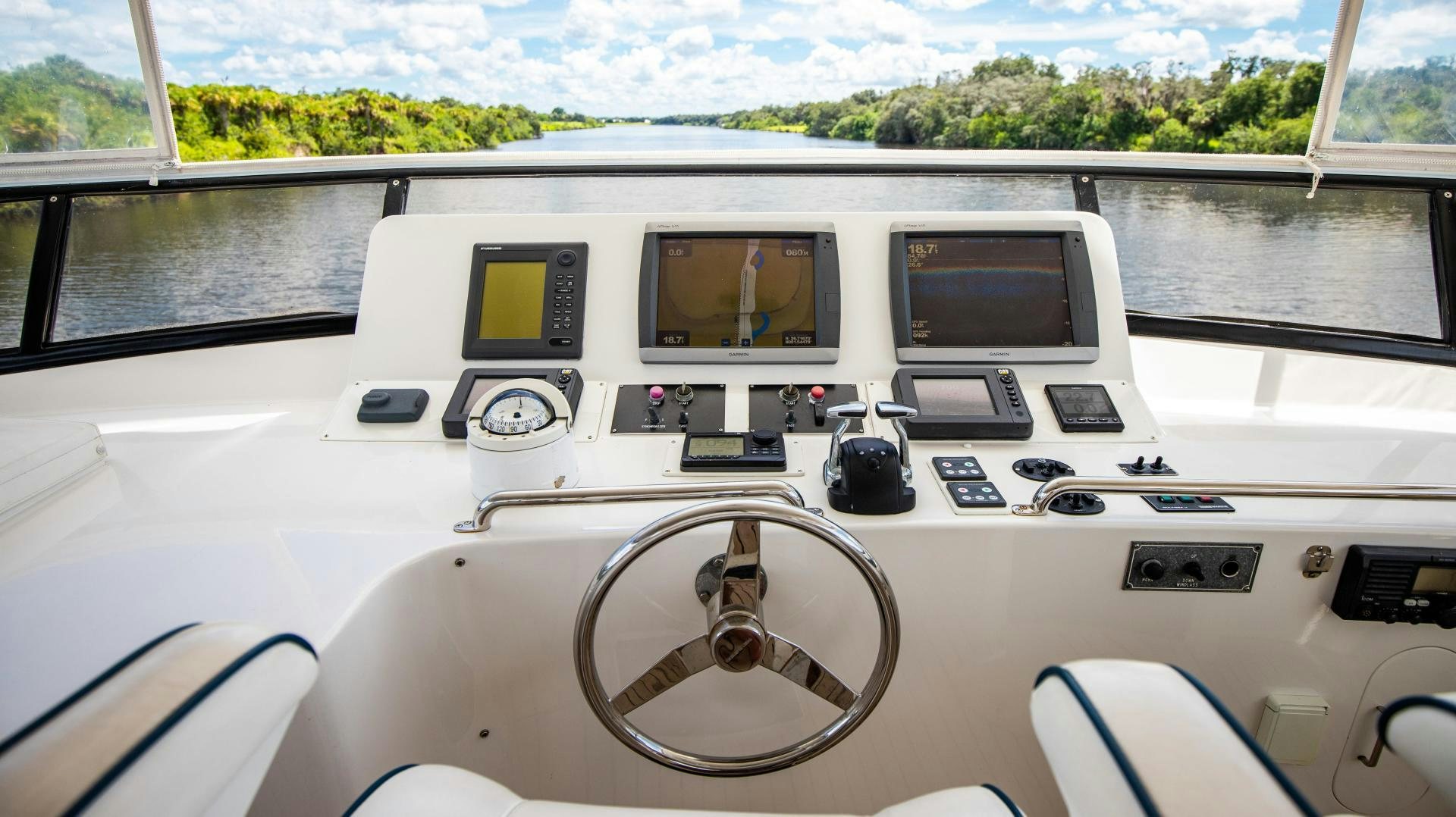 the inside of a car aboard DREAMCHASER Yacht for Sale