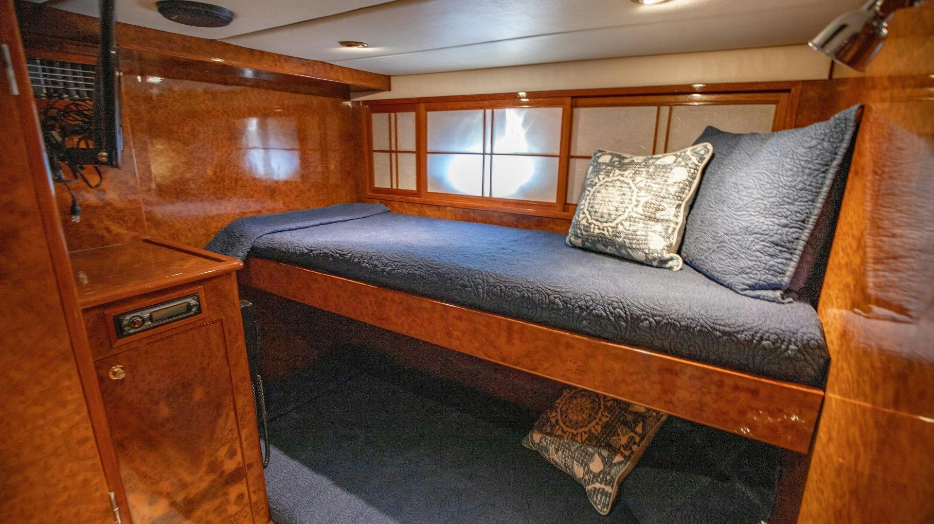 a bed in a room aboard DREAMCHASER Yacht for Sale