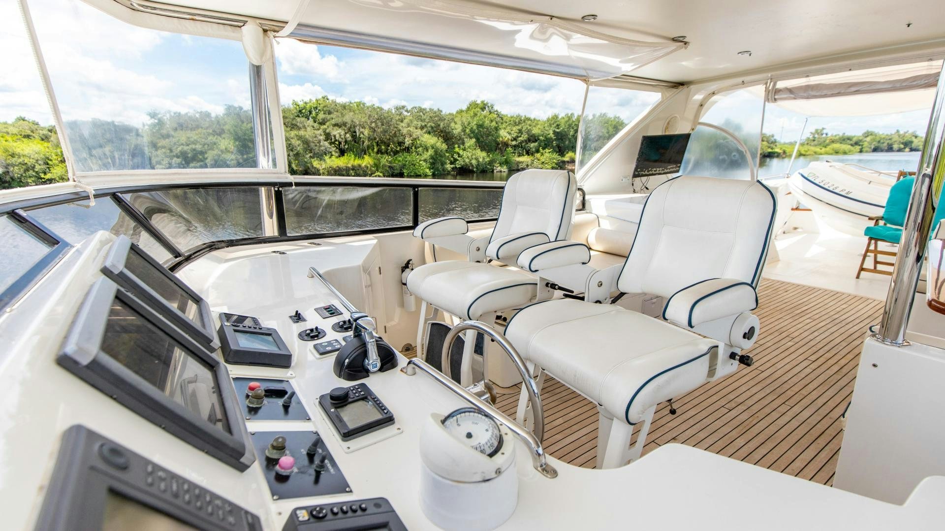 inside of a car aboard DREAMCHASER Yacht for Sale