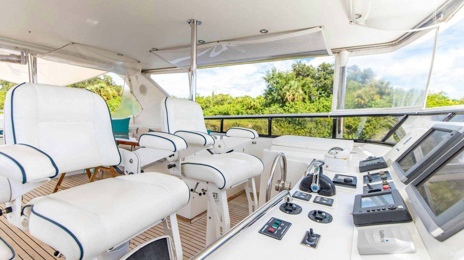 inside of a car aboard DREAMCHASER Yacht for Sale