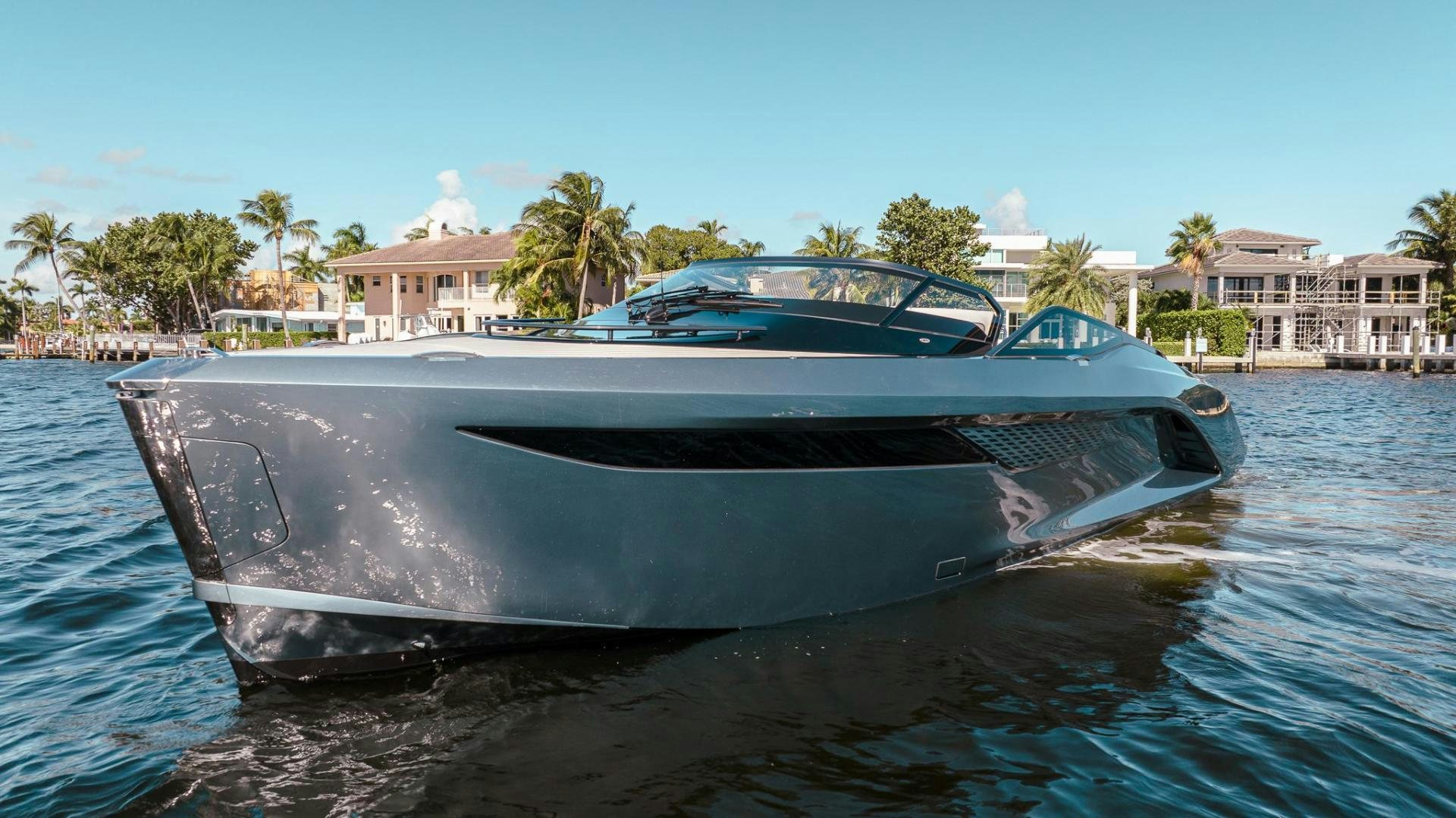 a car on a body of water aboard PR35 Yacht for Sale