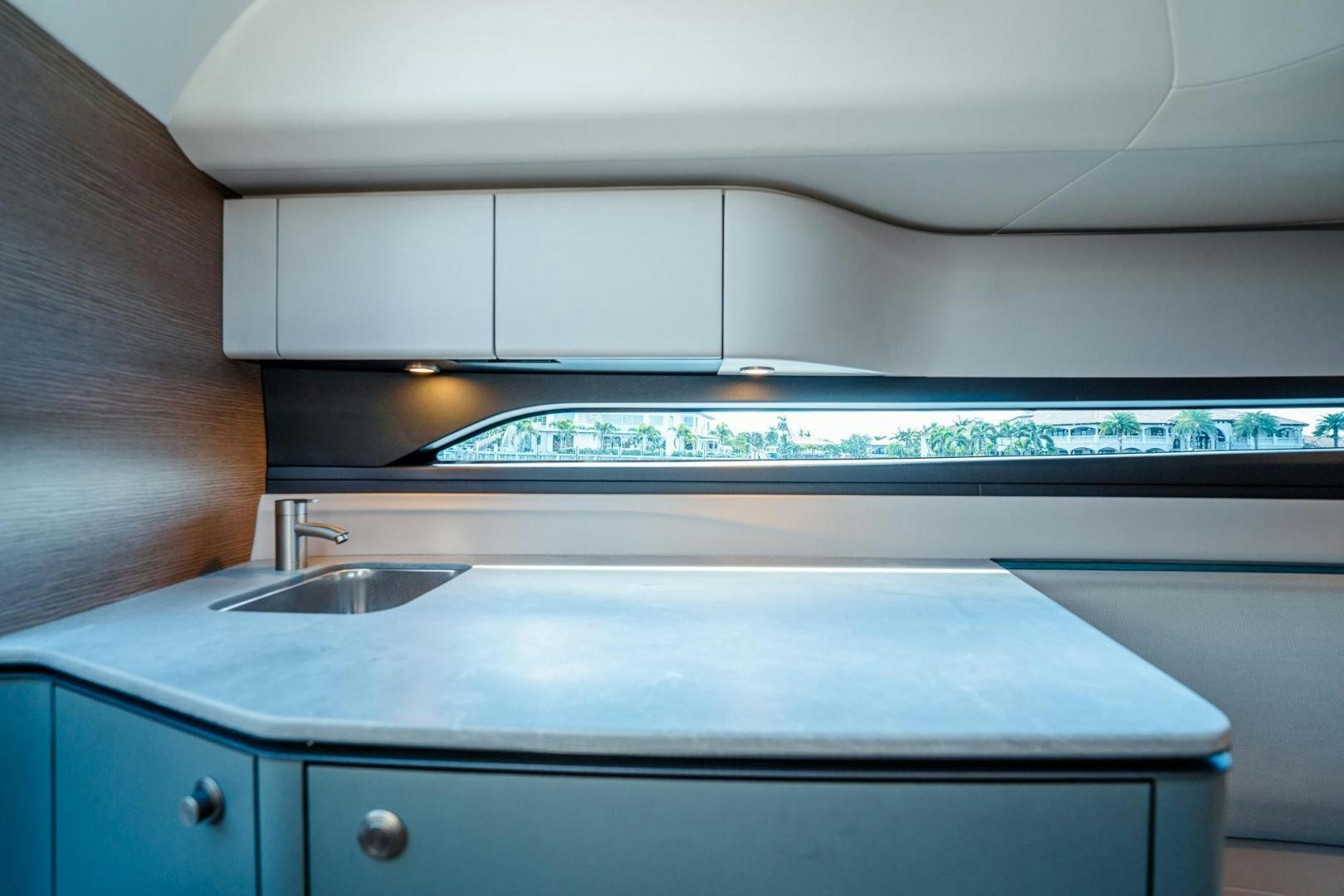 a kitchen with a sink aboard PR35 Yacht for Sale