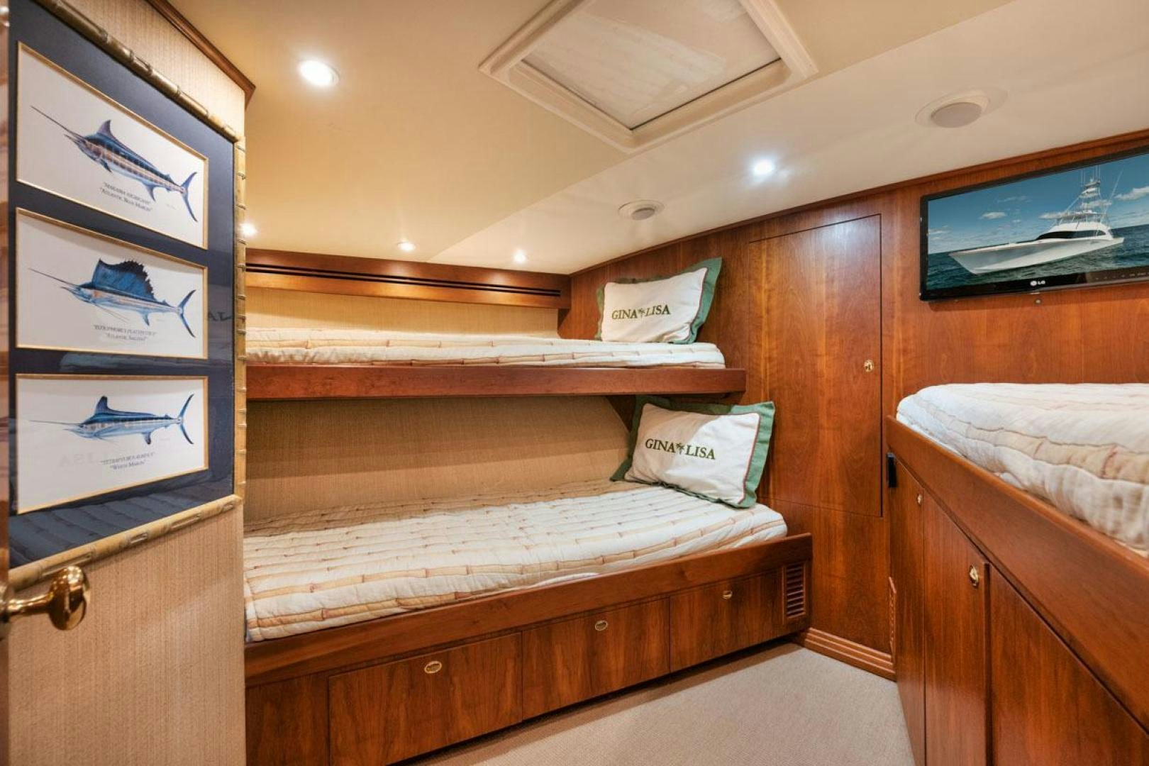 a bed in a room aboard Gina Lisa Yacht for Sale