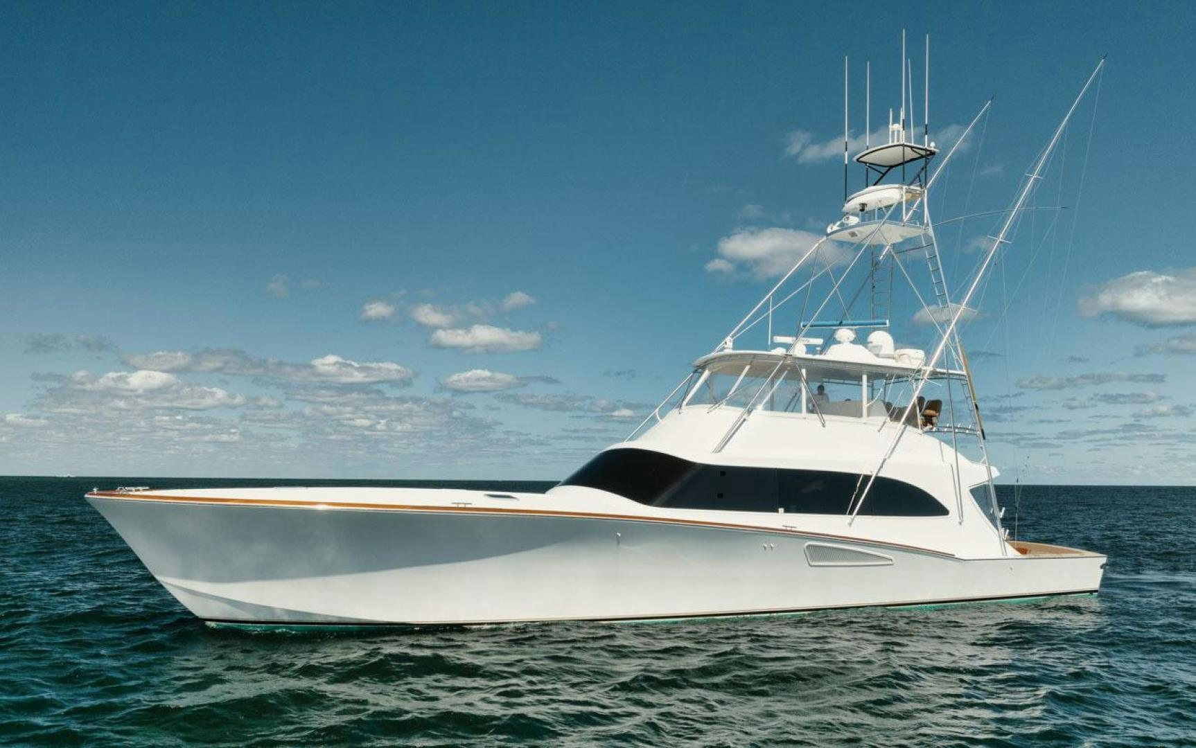 a white yacht in the water aboard Gina Lisa Yacht for Sale