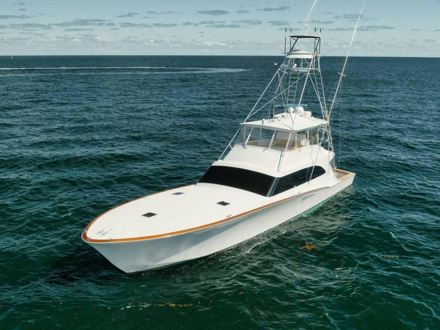 a white boat in the water aboard Gina Lisa Yacht for Sale